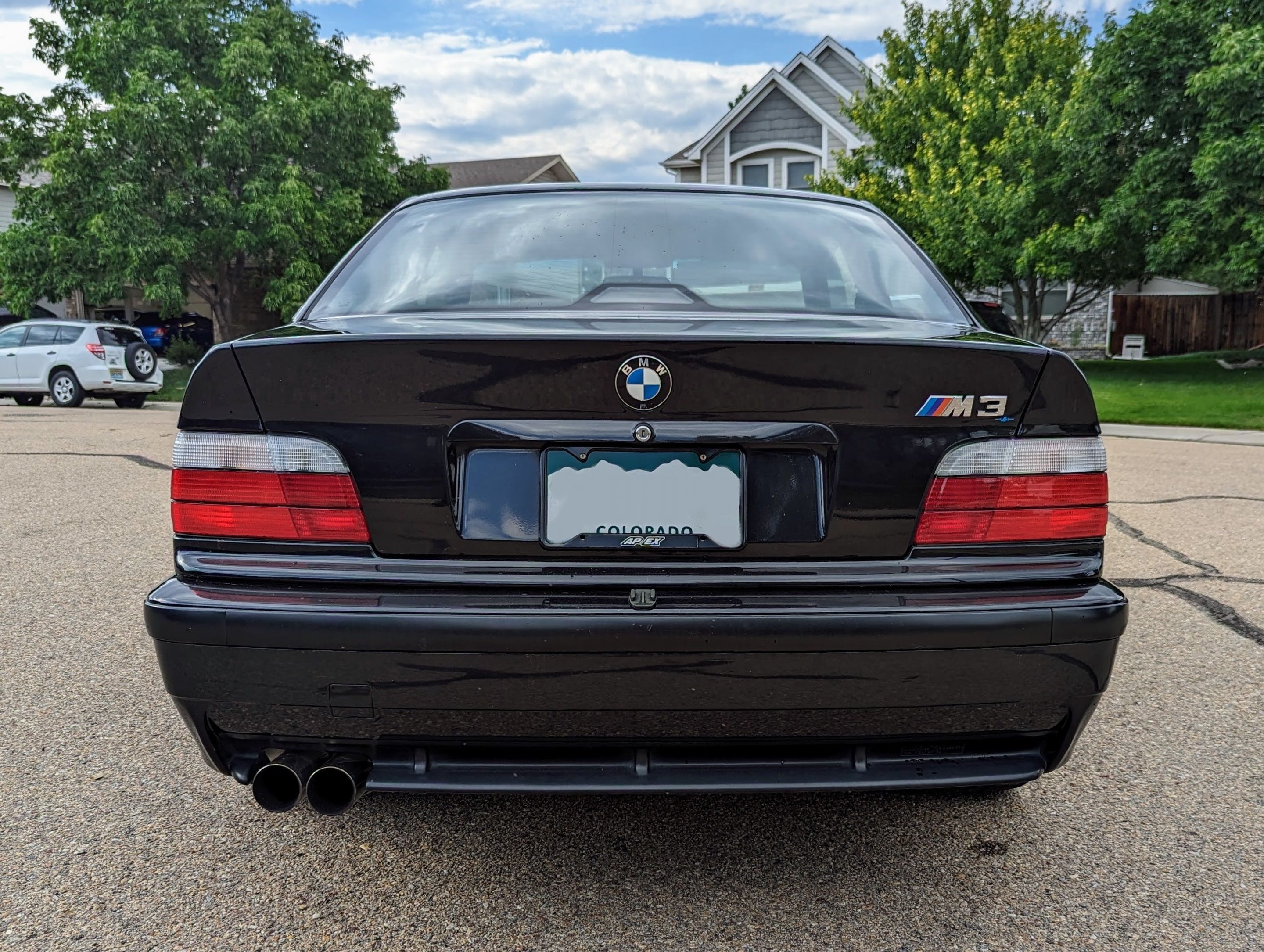 Black BMW E36 M3 with 17" ARC-8 Apex wheels in Hyper Silver