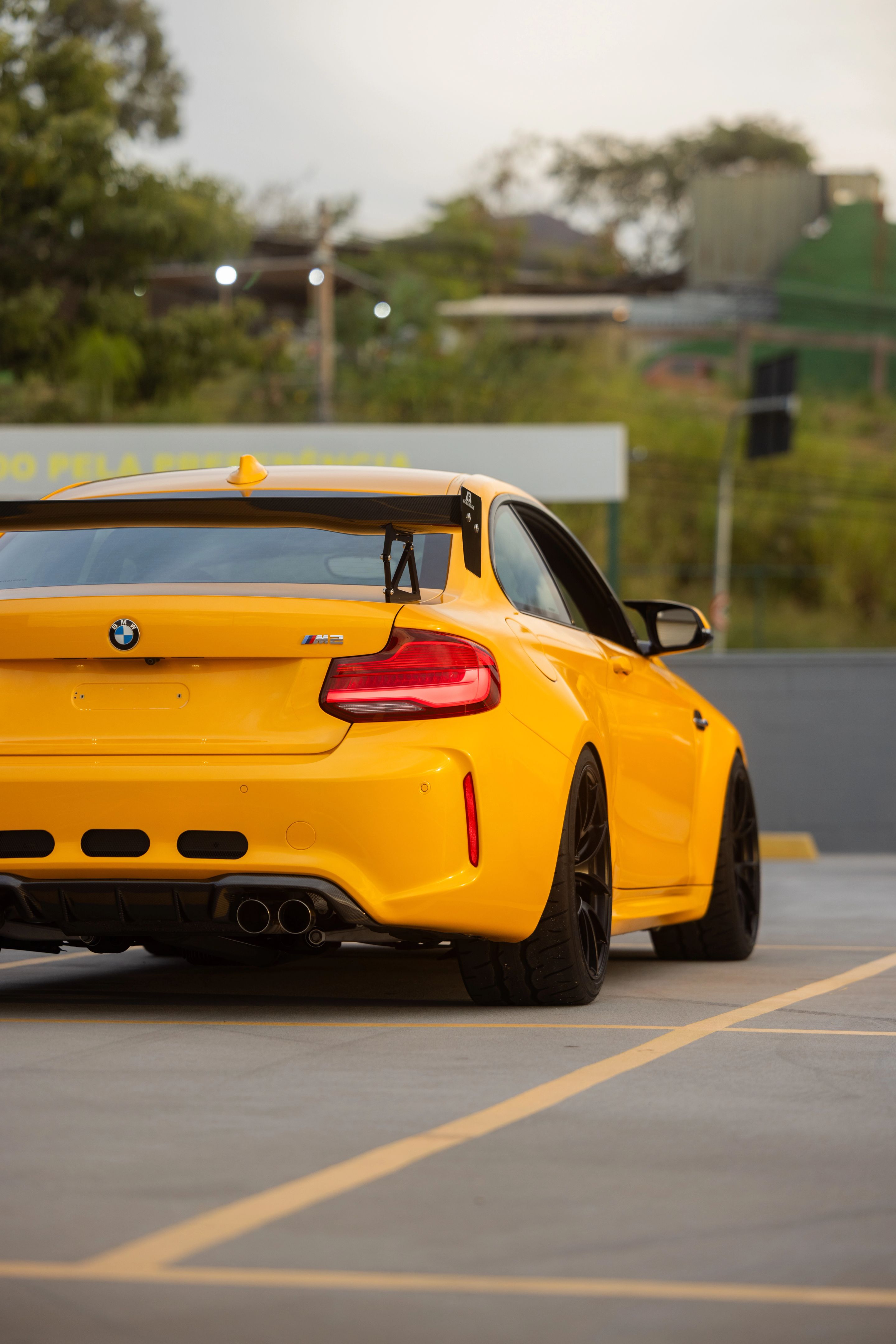 Yellow BMW F87 M2 with 19" VS-5RS Apex wheels in Satin Black