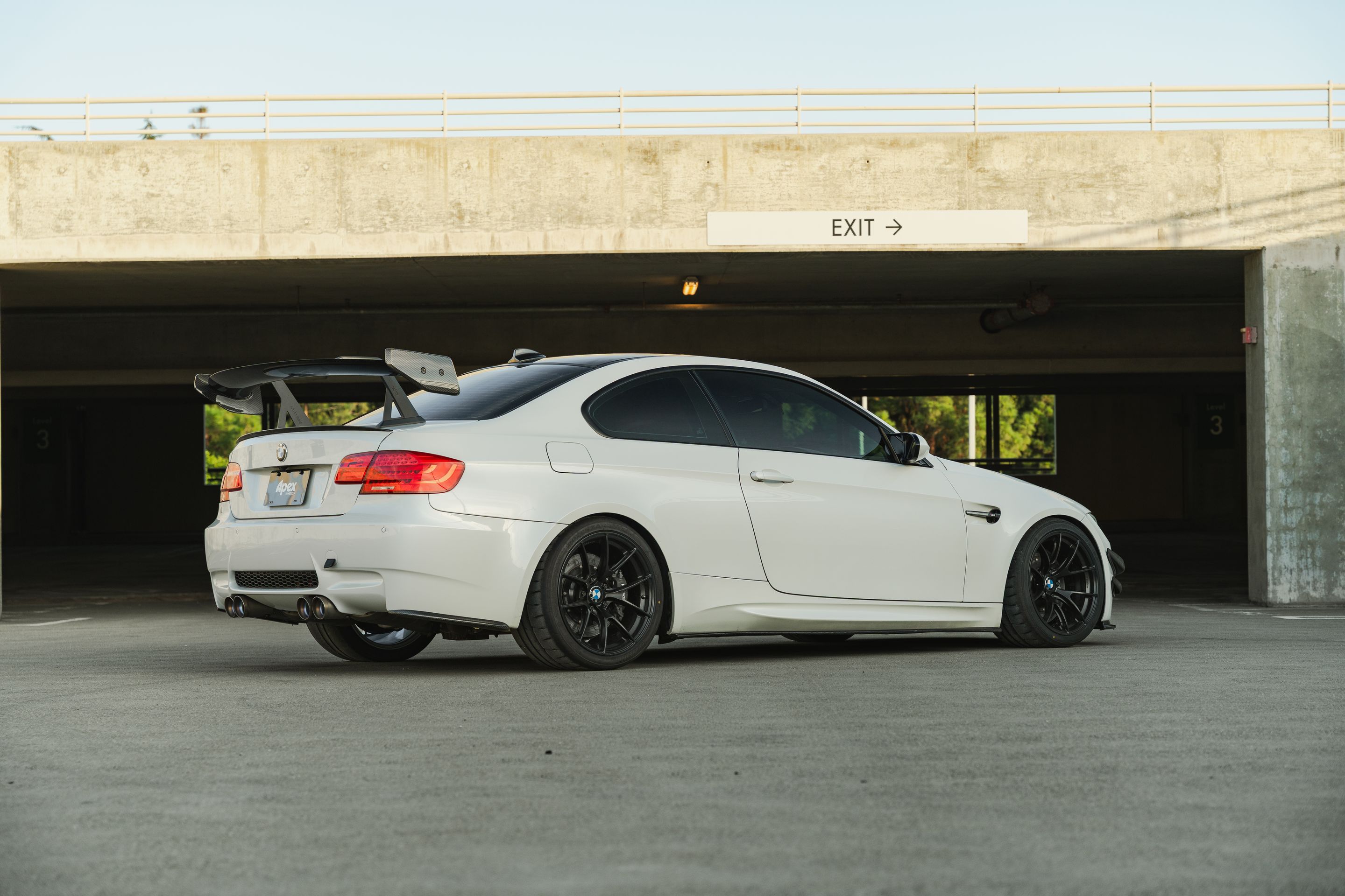 White BMW E92 Coupe M3 with 18" VS-5RS Apex wheels in Satin Black