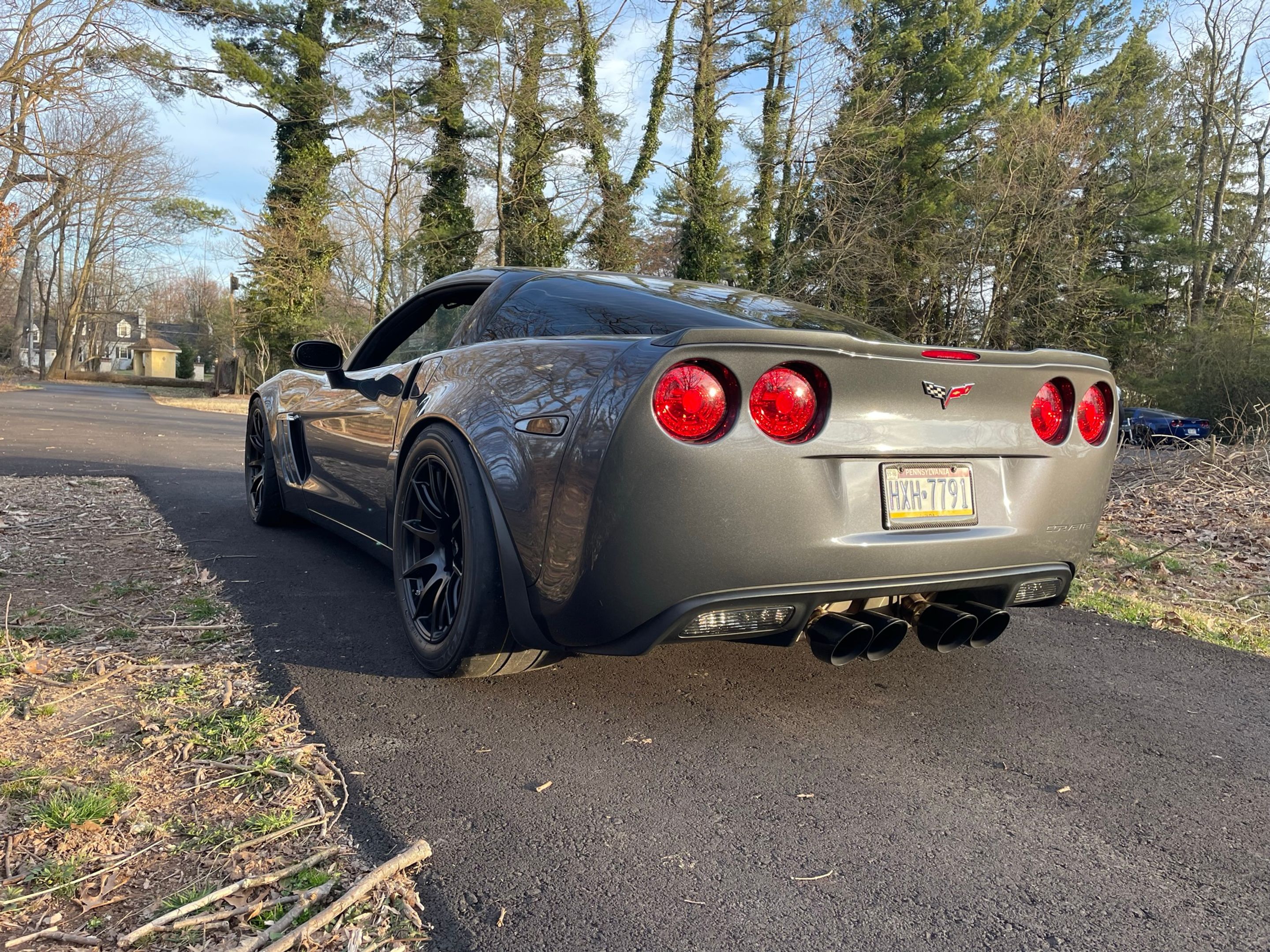 Grey Chevrolet C6 Corvette Grand Sport with 19"/18" SM-10 Apex wheels in Satin Black