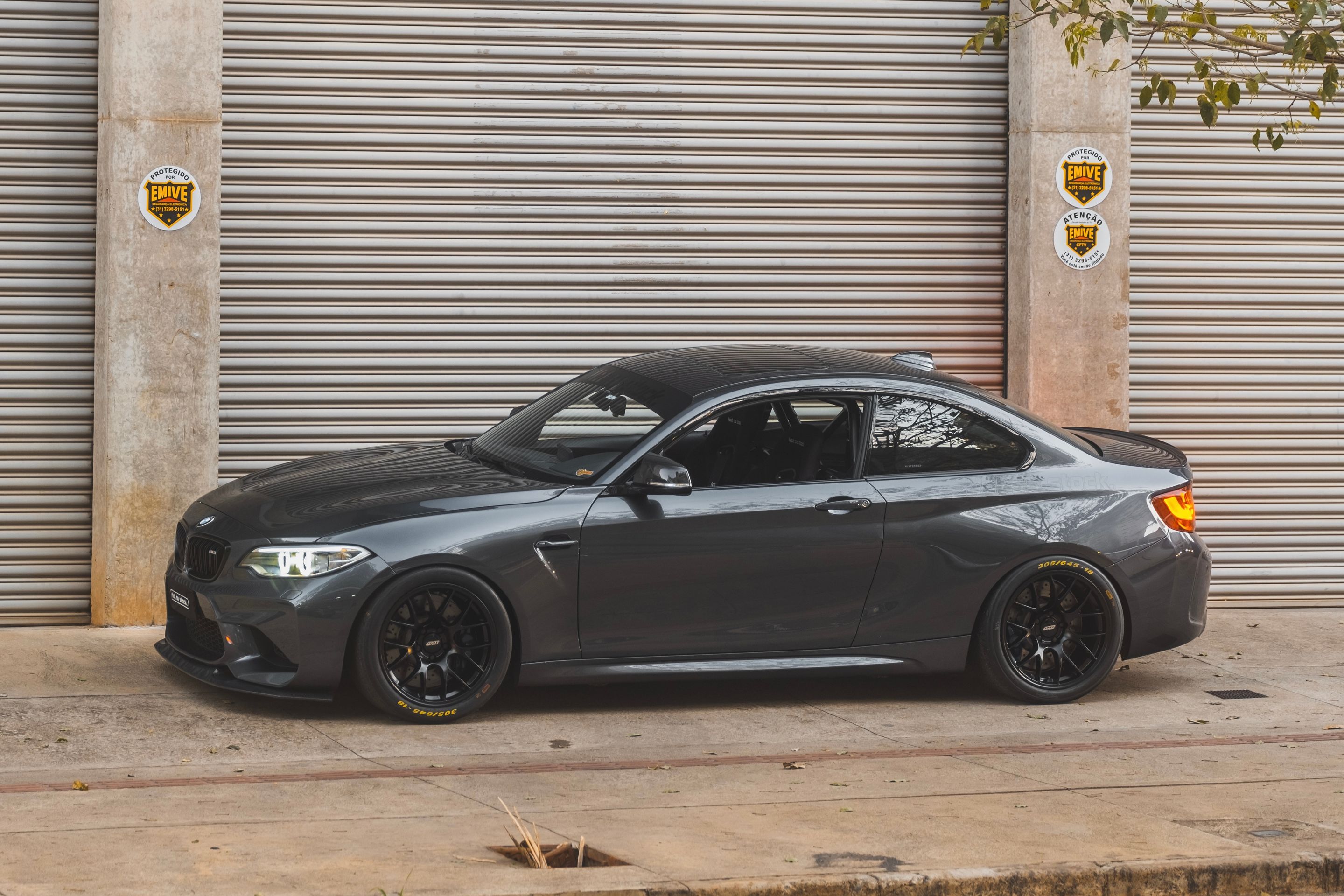 Black BMW F87 M2 with 18" EC-7 Apex wheels in Satin Black