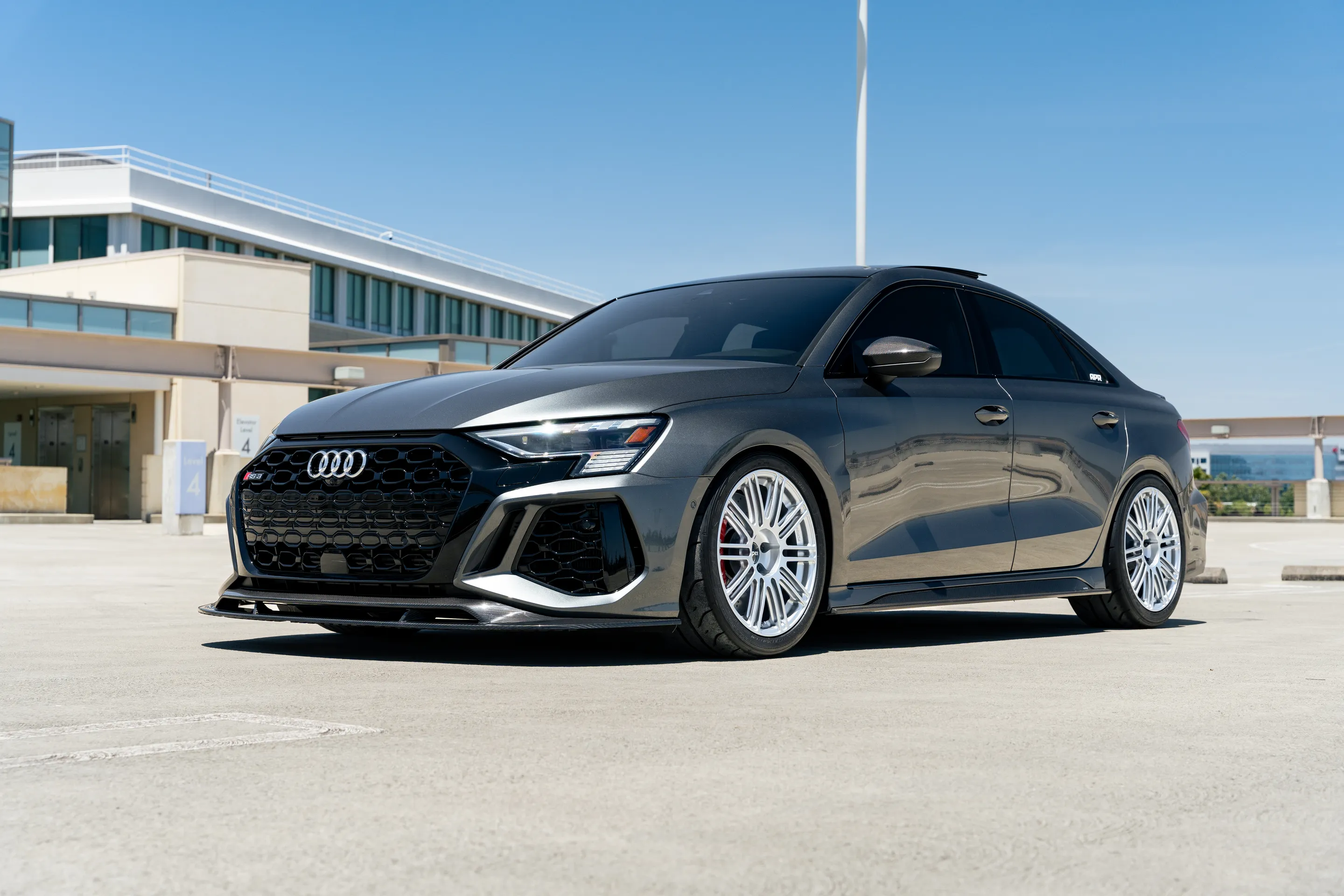 Grey Audi 8Y RS 3 with 18" TC-10RT Apex wheels in Race Silver