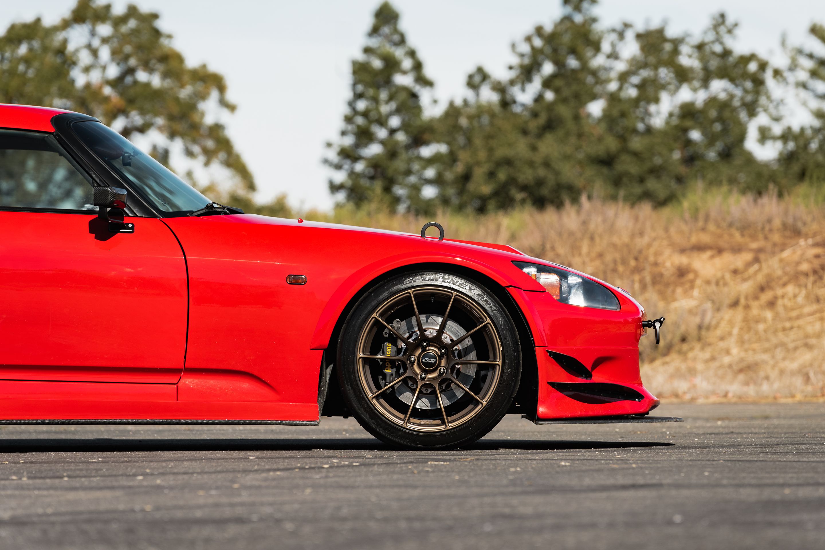 Red Honda S2000 with 18" SM-10RS Apex wheels in Satin Bronze