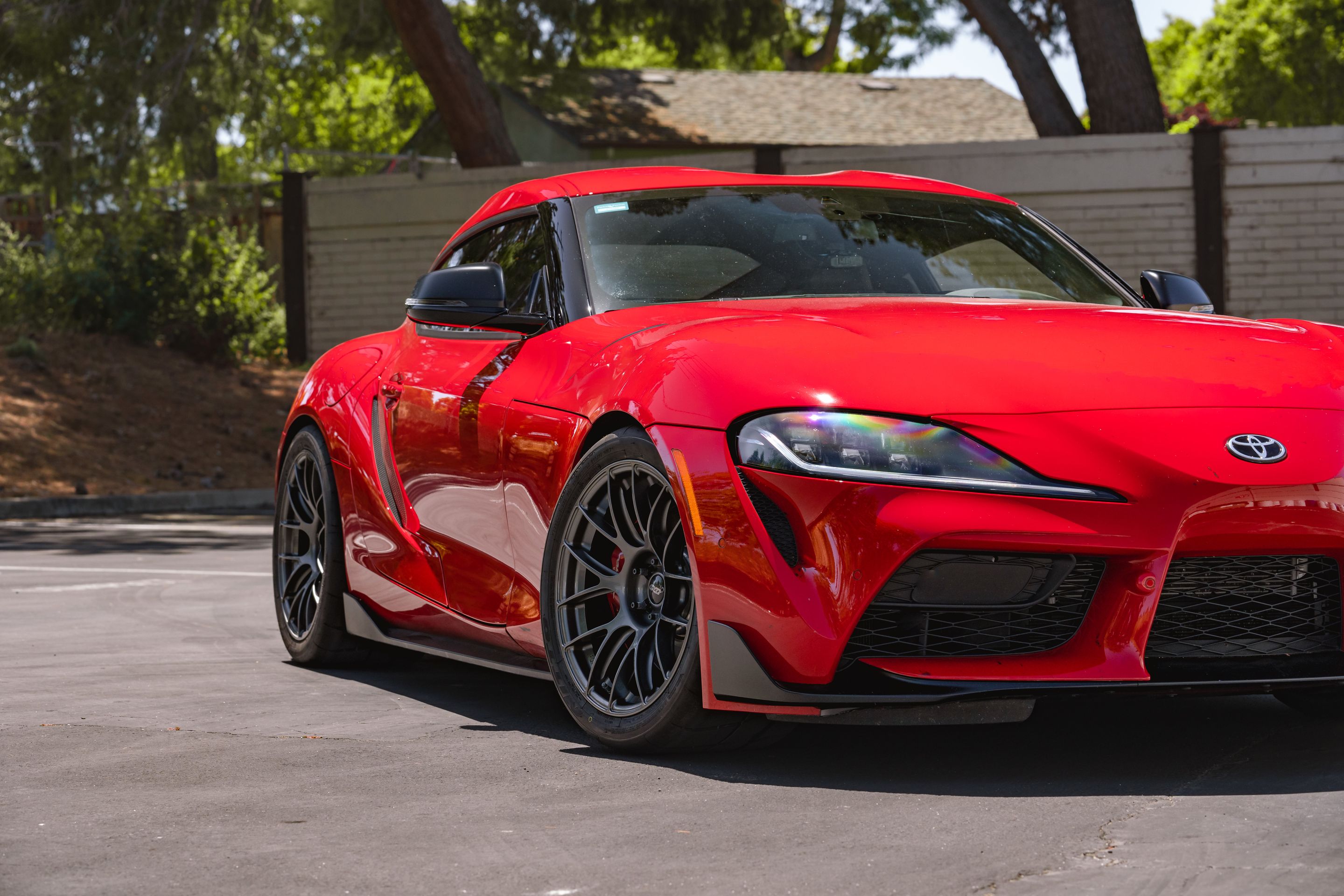 Red Toyota GR Supra with 18" EC-7RS Apex wheels in Anthracite