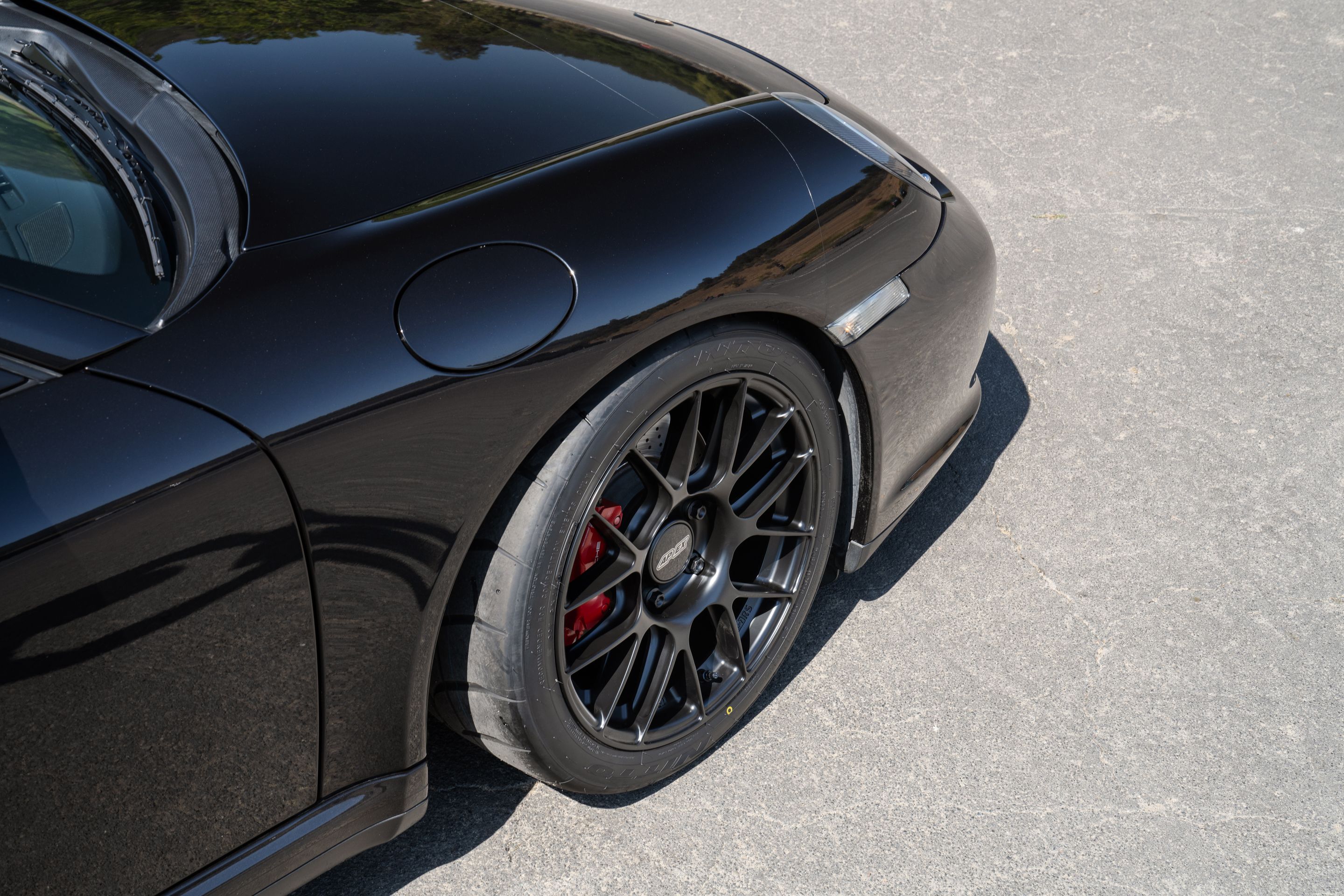 Black Porsche 911 997 Carrera 4S with 18" EC-7RS Apex wheels in Satin Black