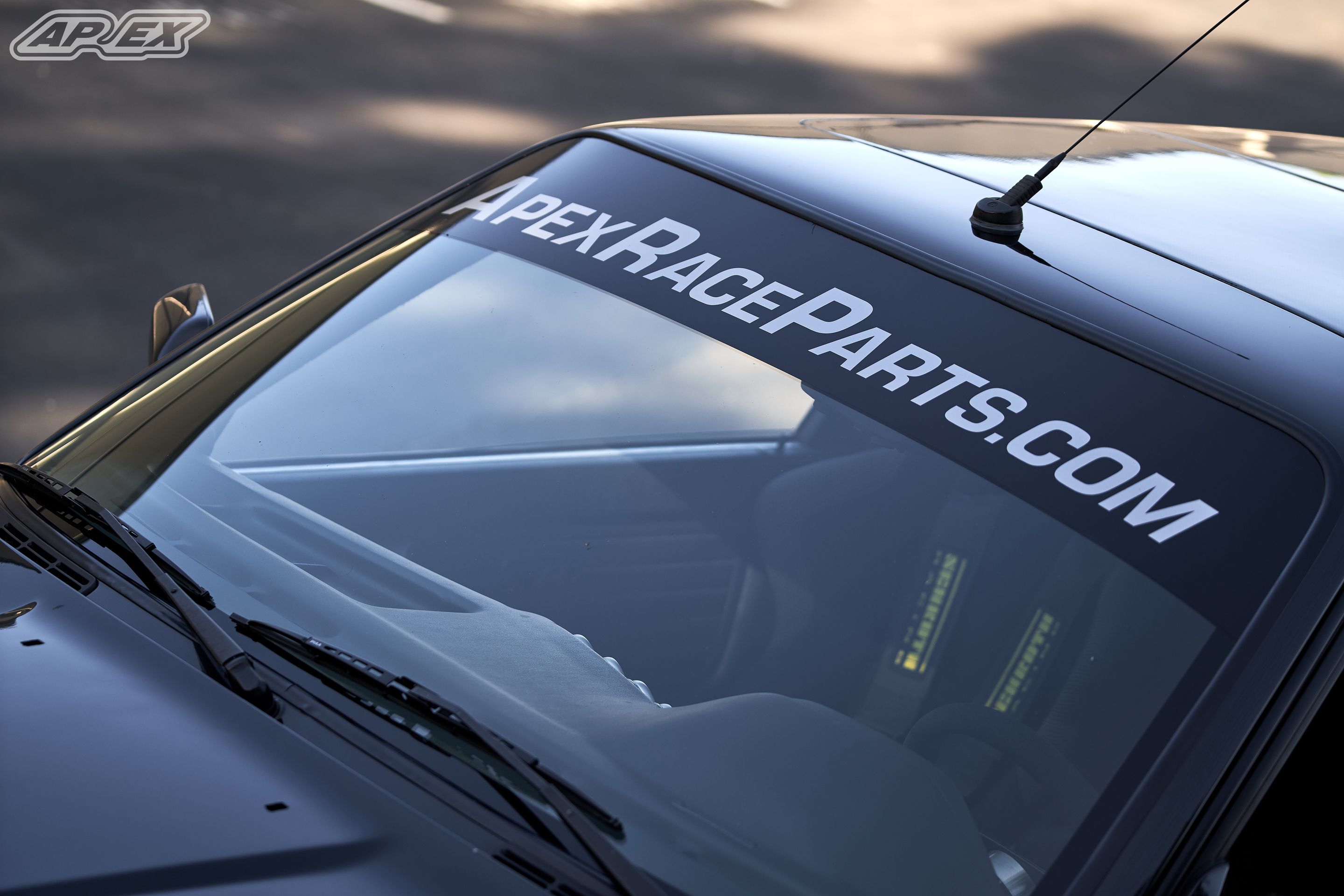 Black BMW E30 M3 with 17" ARC-8 Apex wheels in Hyper Silver