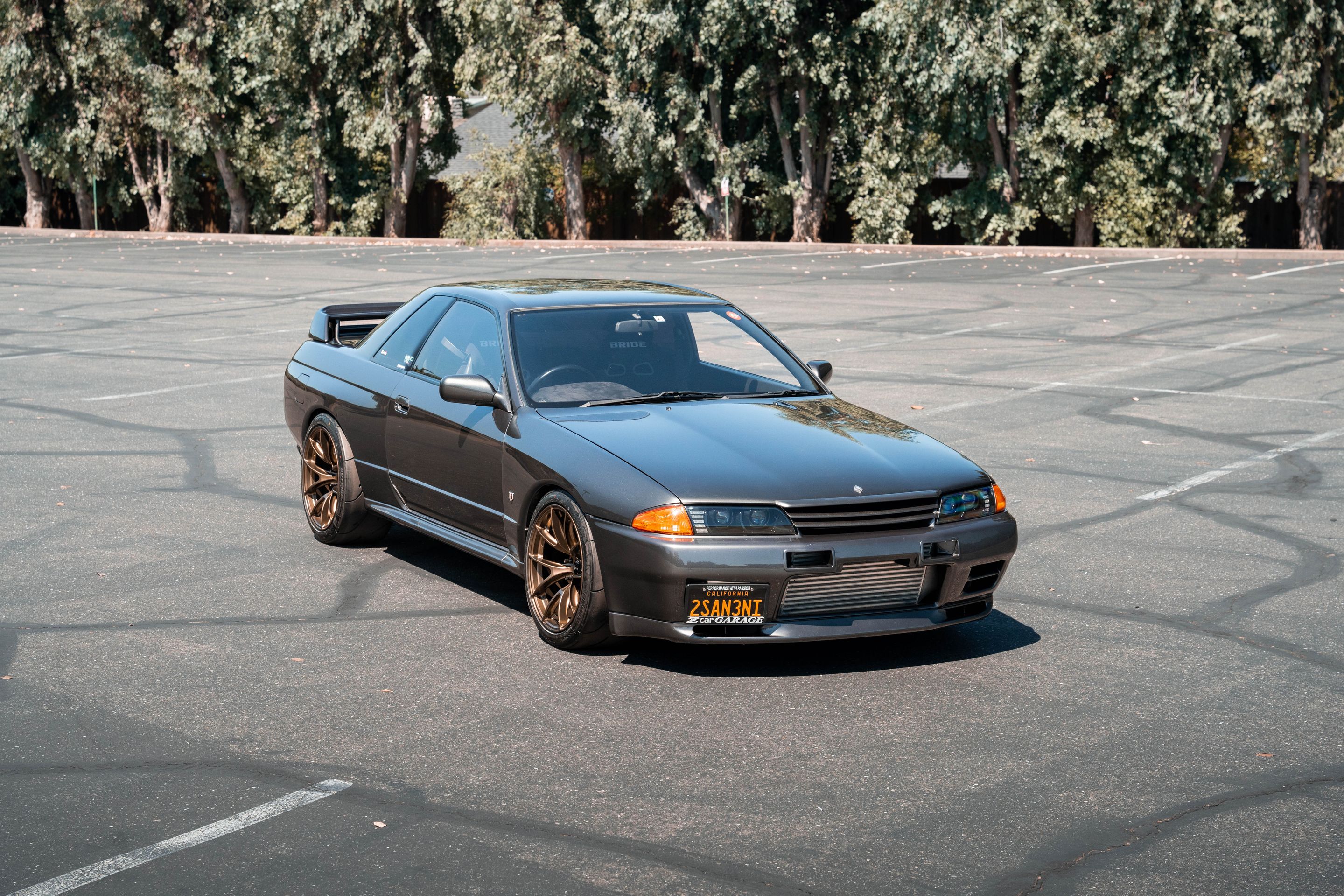 Grey Nissan R32 GT-R with 18" VS-5RS Apex wheels in Satin Bronze