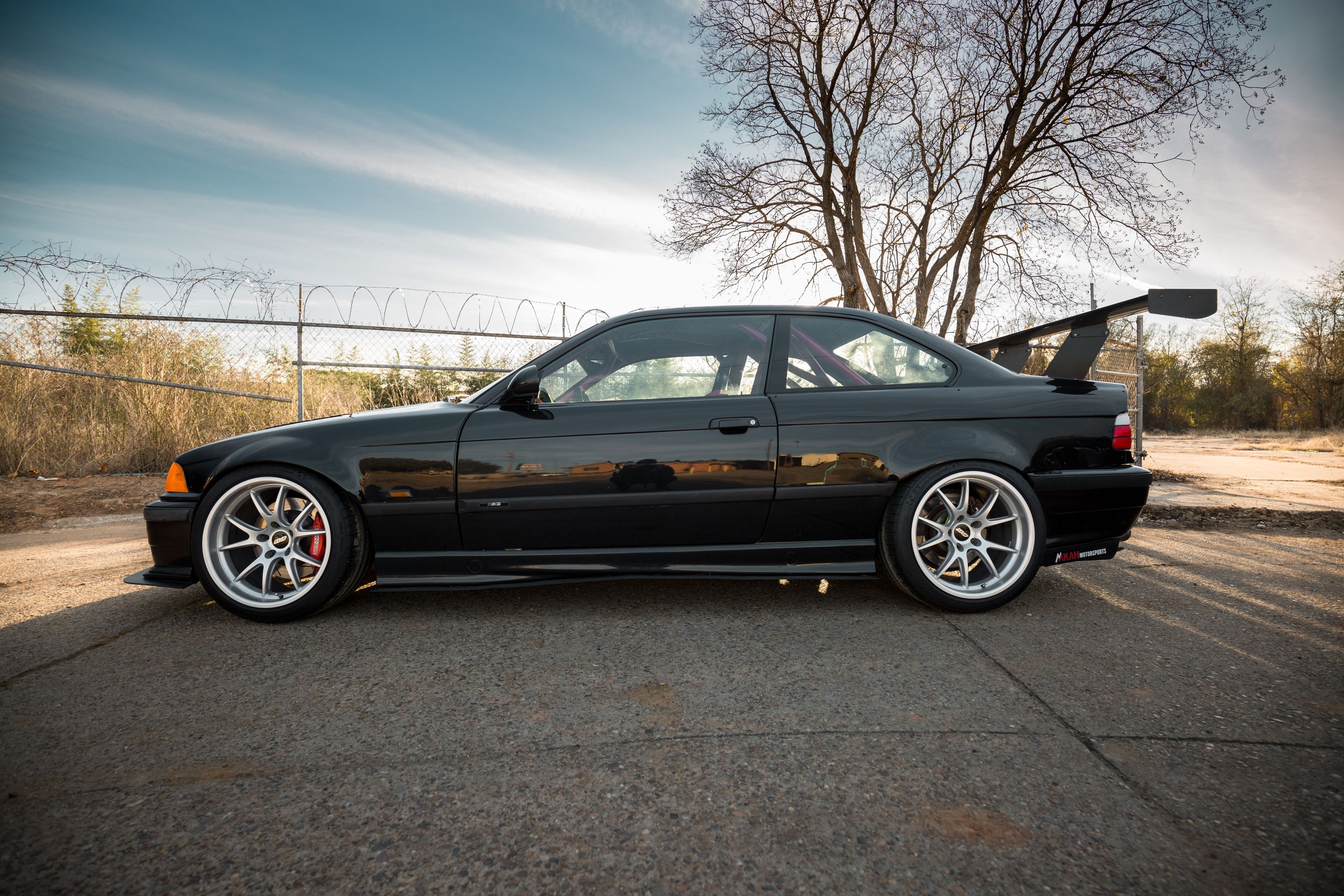 Black BMW E36 M3 with 18" FL-5 Apex wheels in Race Silver