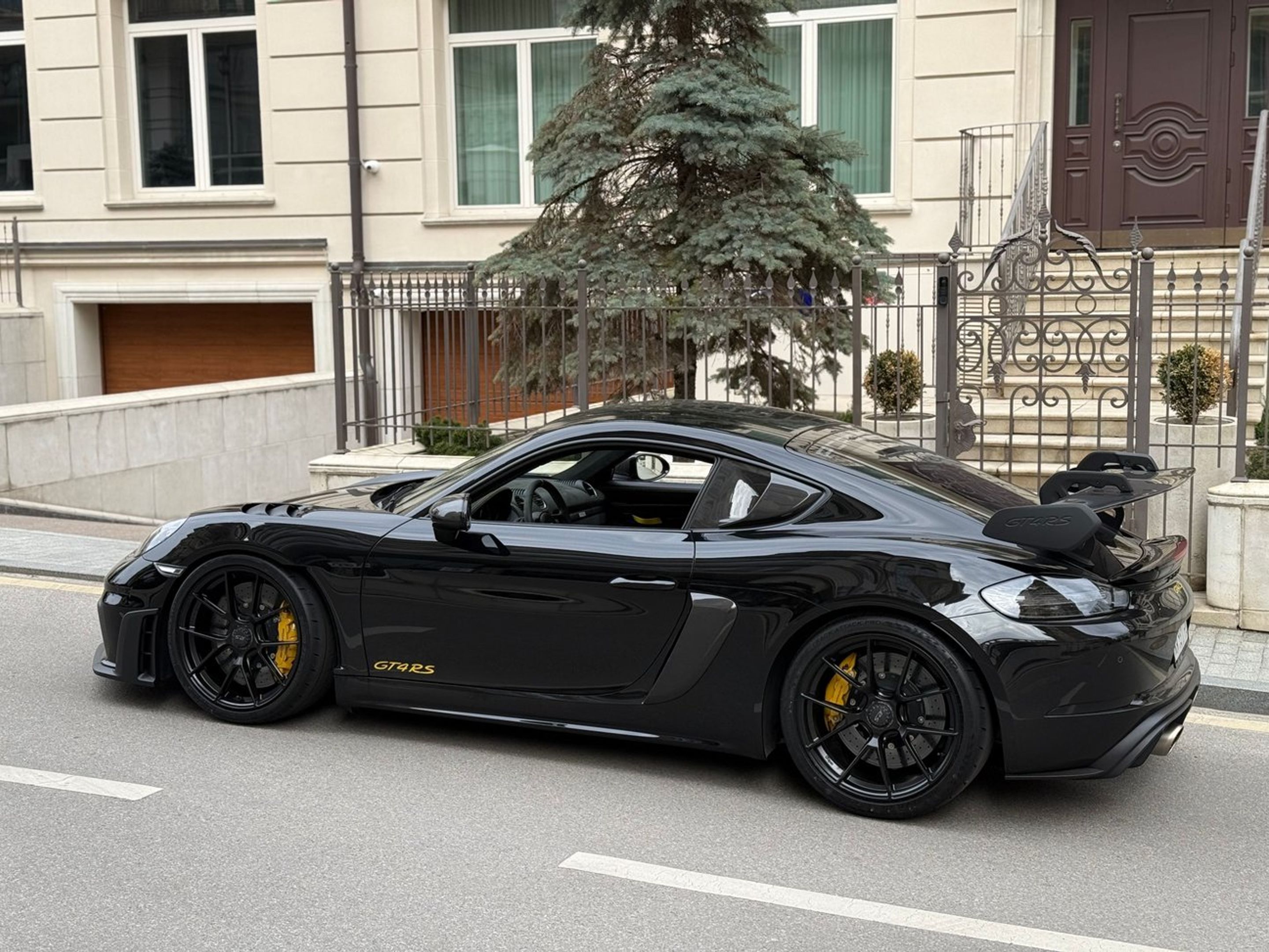Black Porsche 718 Cayman GT4 RS with 20" VS-5RS Apex wheels in Satin Black