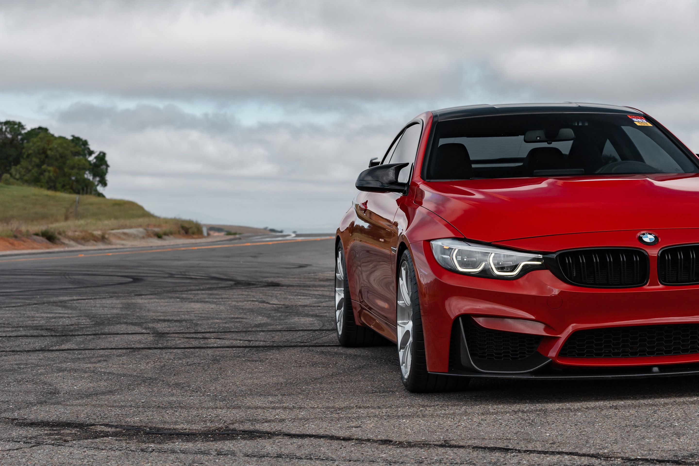 Red BMW F82 Coupe M4 with 19" EC-7RS Apex wheels in Brushed Clear