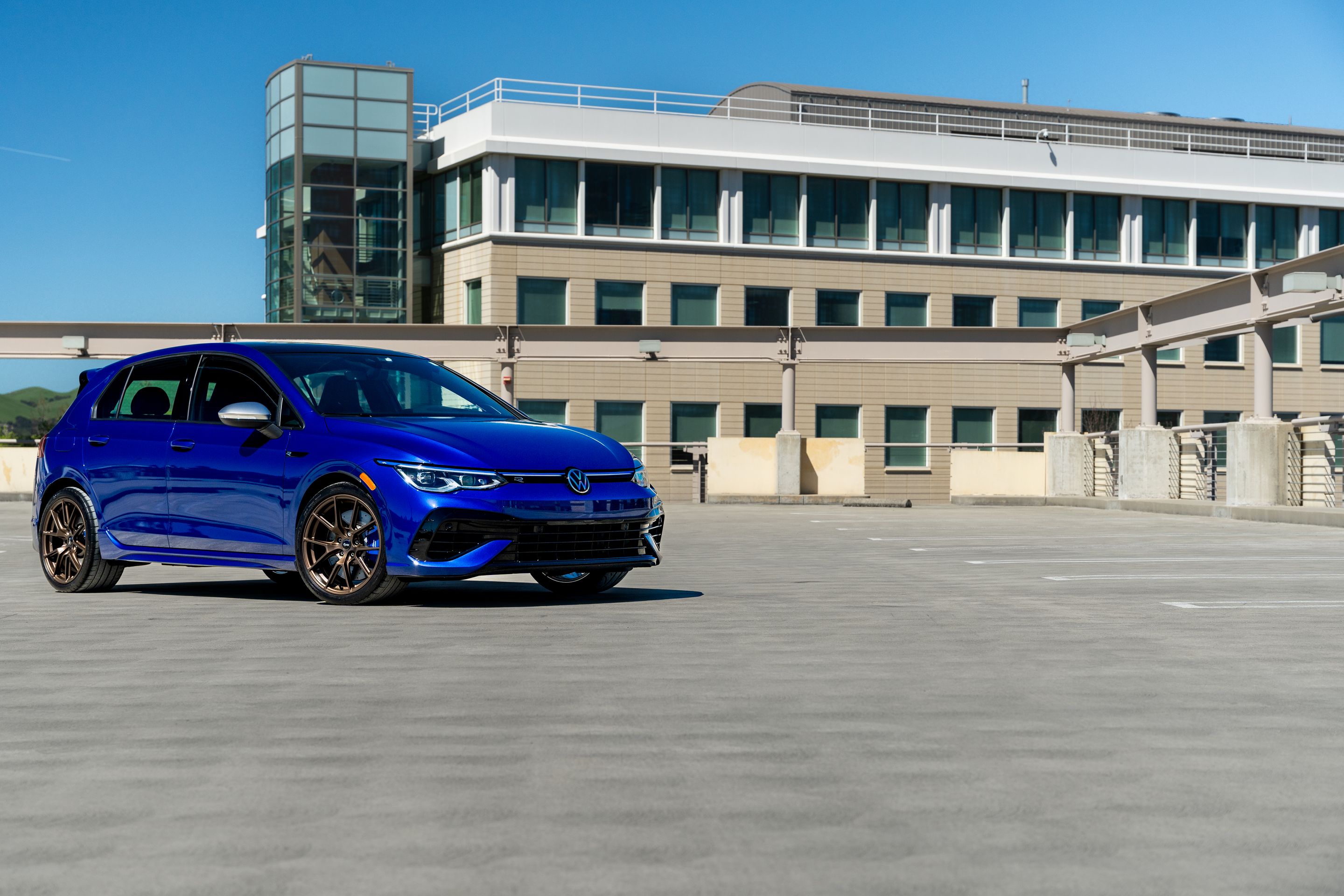 Blue VW MK8 Golf R with 18" VS-5 Apex wheels in Satin Bronze