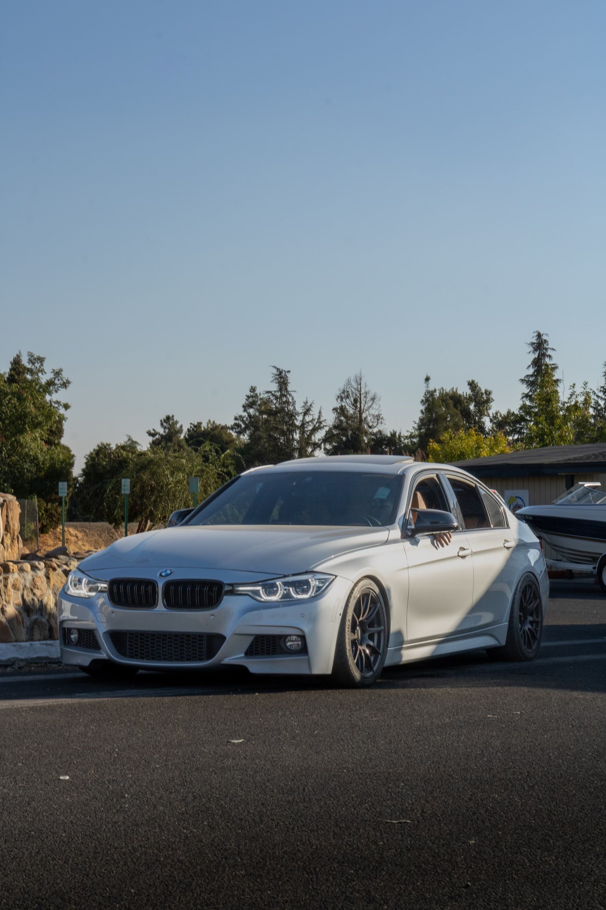 Silver BMW F30 Sedan 3 Series with 18" SM-10 Apex wheels in Satin Black