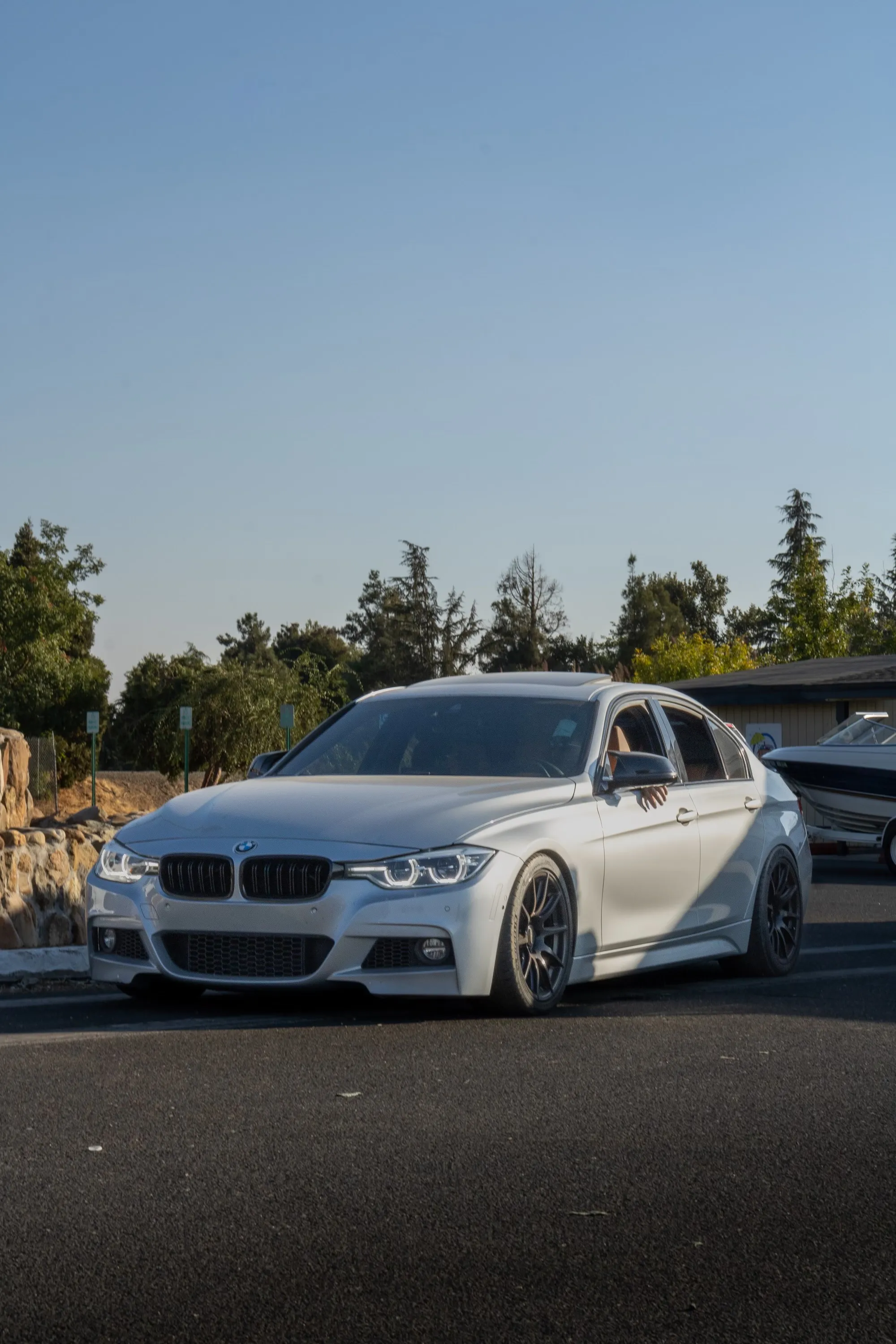 Silver BMW F30 Sedan 3 Series with 18" SM-10 Apex wheels in Satin Black
