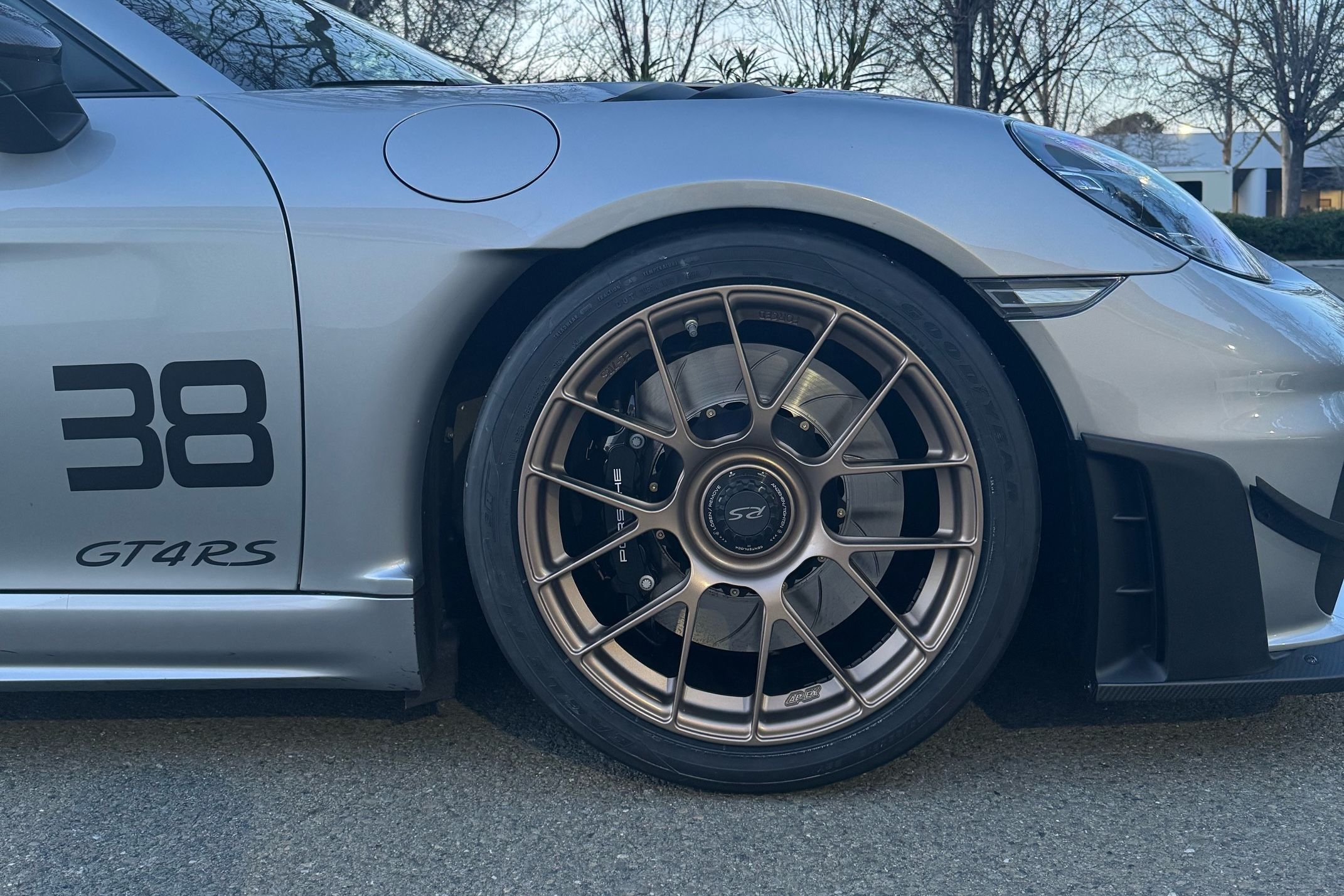 Silver Porsche 718 Cayman GT4 RS with 19" EC-7RS Apex wheels in Custom Finish