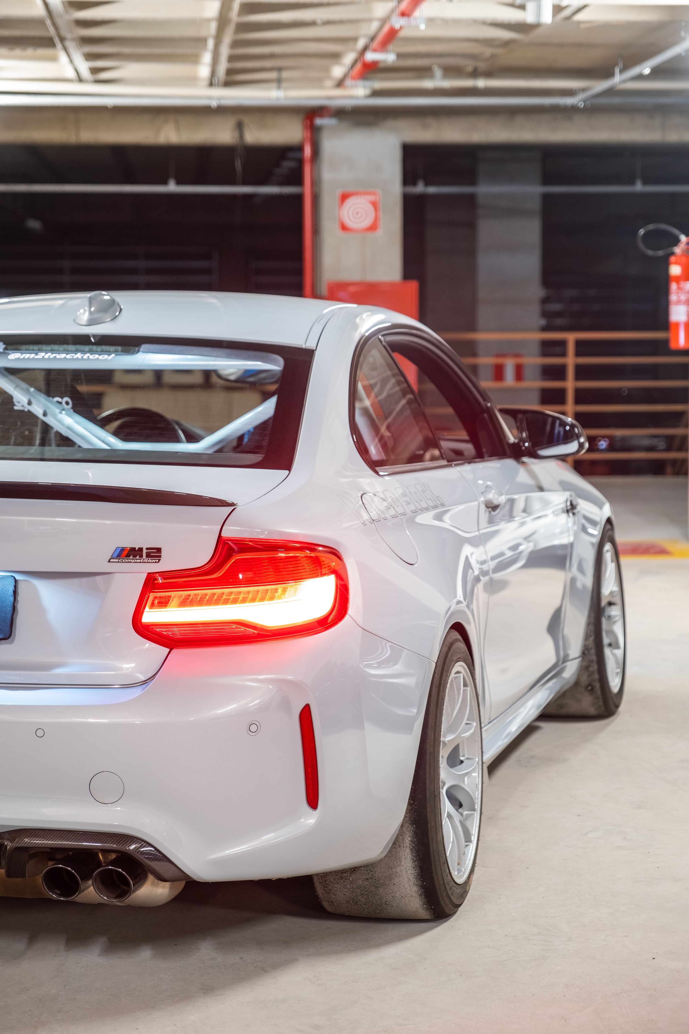 Grey BMW F87 M2 with 18" EC-7 Apex wheels in Race Silver