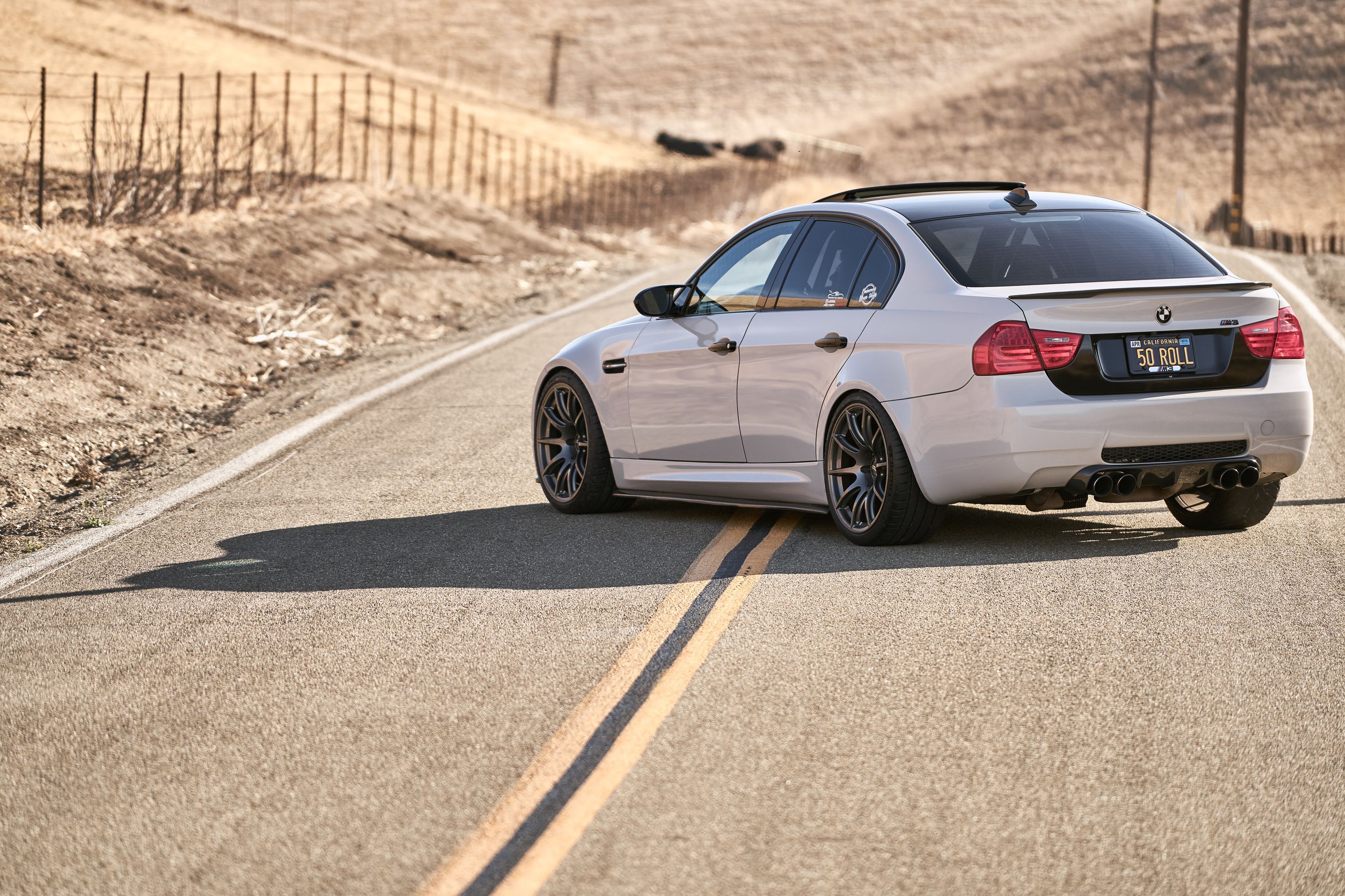 Grey BMW E90 Sedan M3 with 19" SM-10 Apex wheels in Satin Black