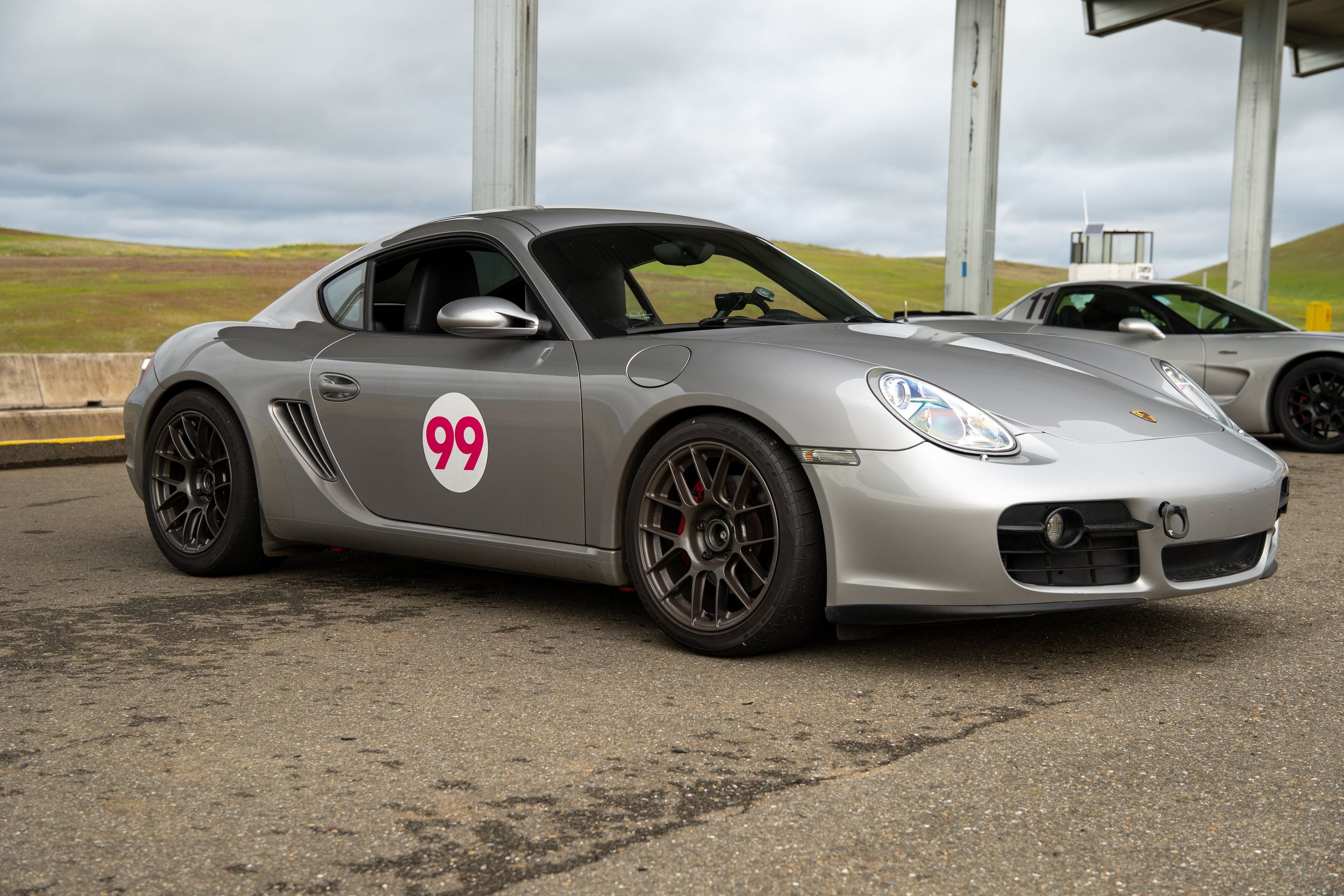 Silver Porsche 987 Cayman S with 18" EC-7RS Apex wheels in Anthracite