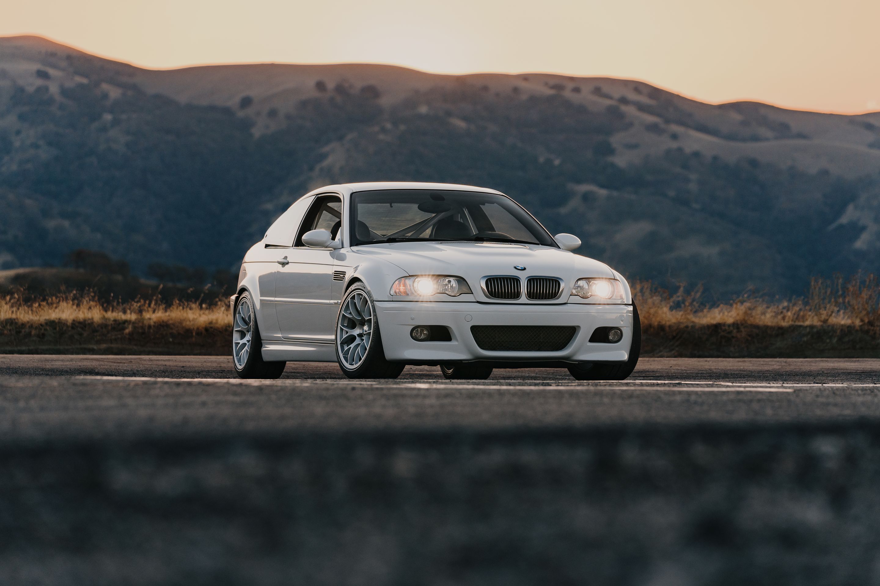 White BMW E46 M3 with 18" EC-7 Apex wheels in Race Silver