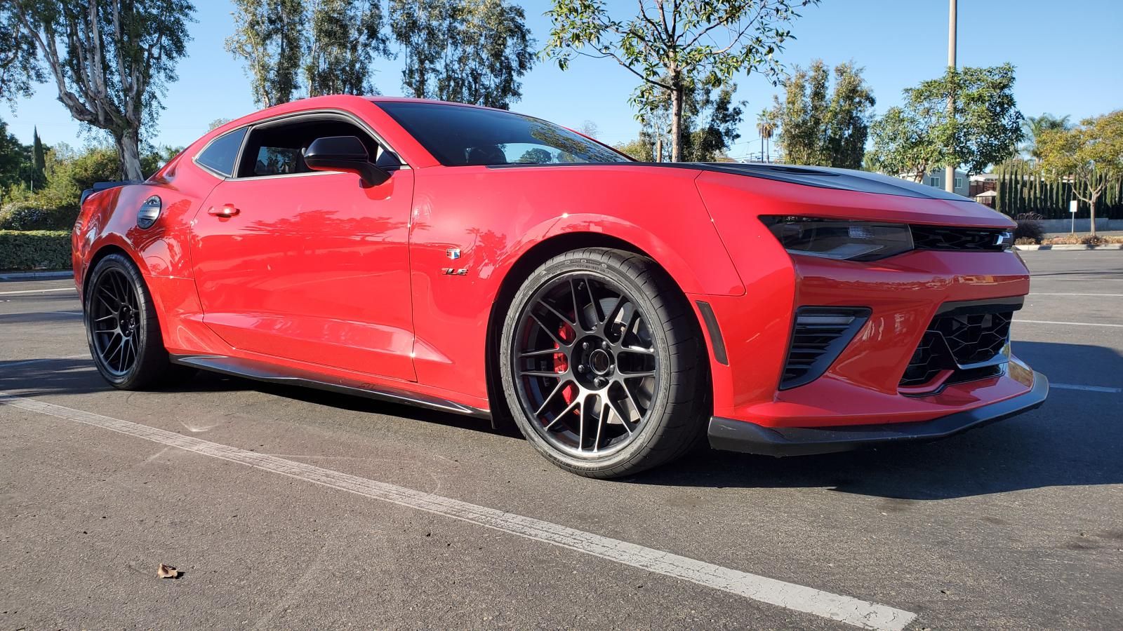 Red Chevrolet 6th Gen Camaro SS 1LE with 19" ARC-8 Apex wheels in Satin Black