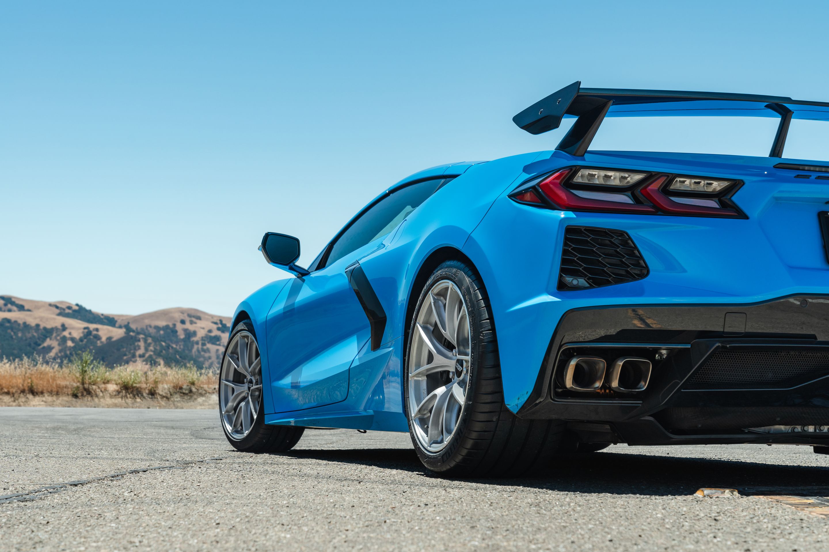 Blue Chevrolet C8 Corvette Stingray/Z51 with 19" VS-5RS Apex wheels in Brushed Clear