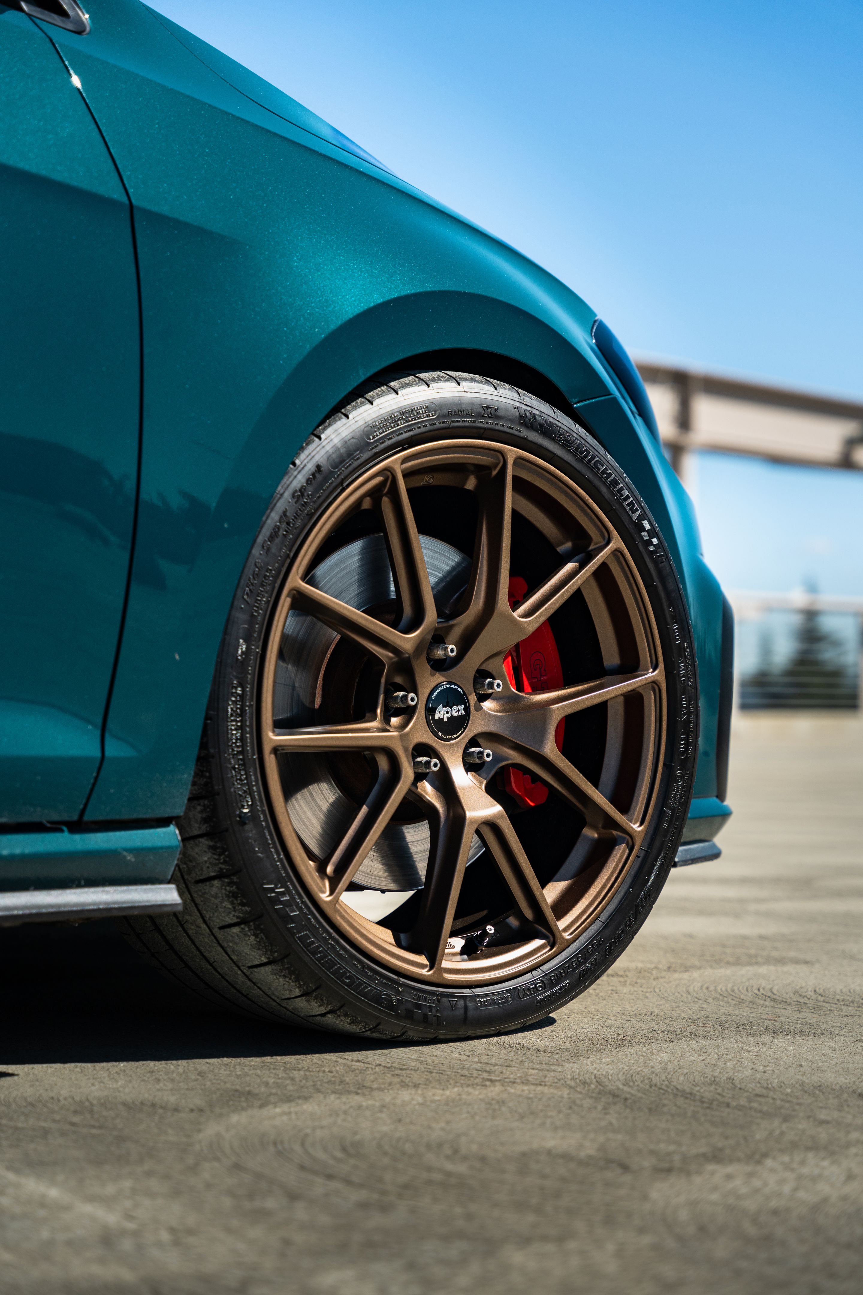 Green VW MK7 GTI with 18" VS-5 Apex wheels in Satin Bronze