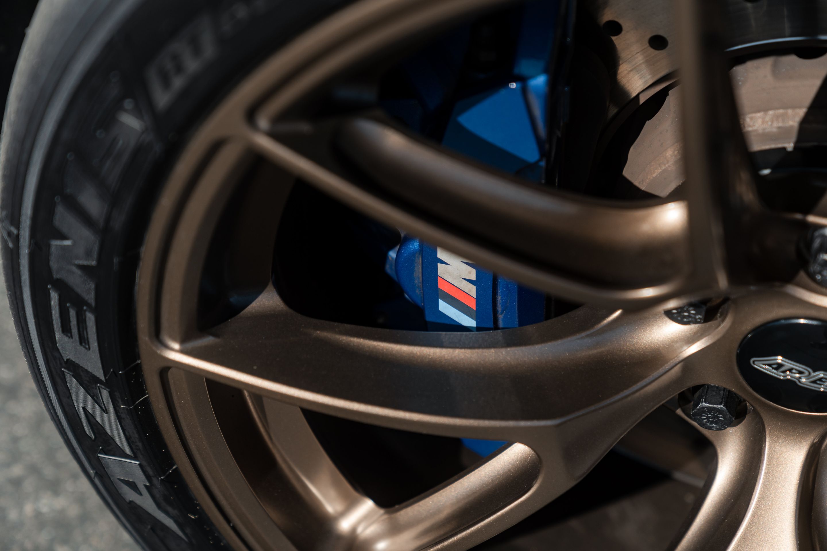 Grey BMW F90 M5 with 19" VS-5RS Apex wheels in Satin Bronze