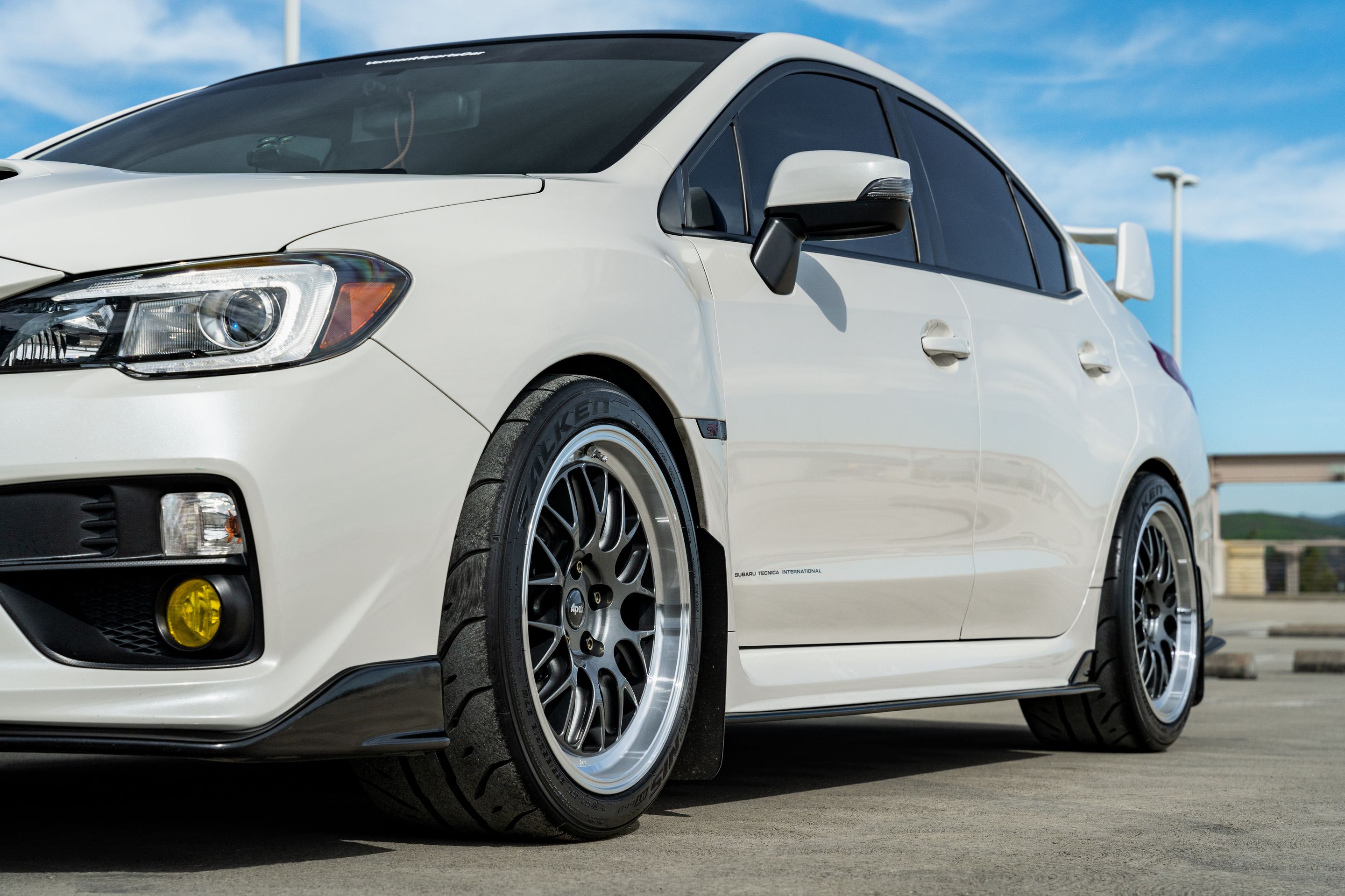 White Subaru VA WRX STI with 18" ML-10RT Apex wheels in Machined Lip Anthracite