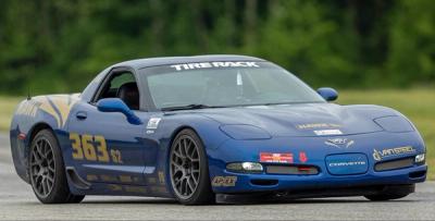 Blue Chevy C5 Corvette on race track with APEX EC-7 Wheels