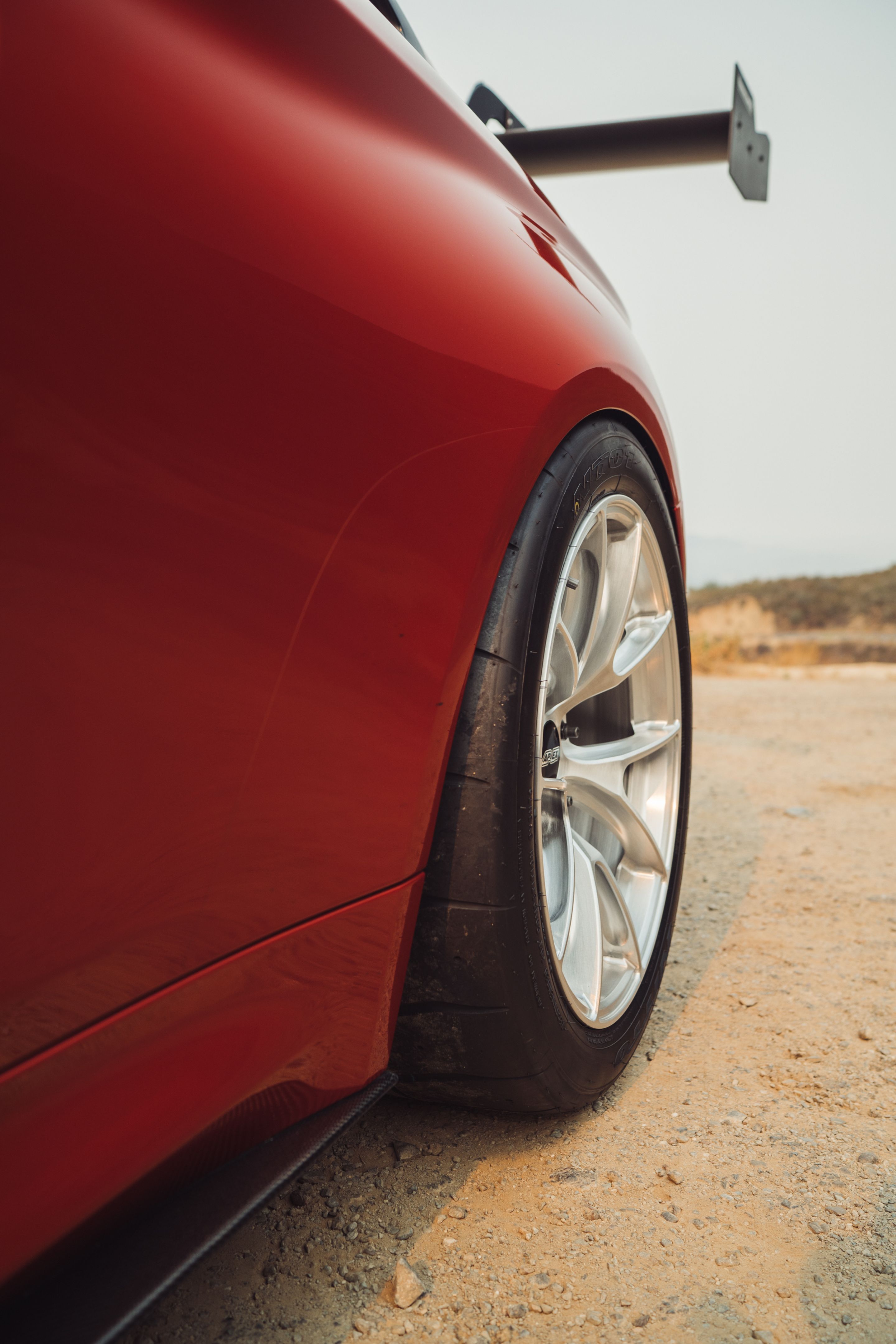 Orange BMW F82 Coupe M4 with 18" VS-5RS Apex wheels in Brushed Clear