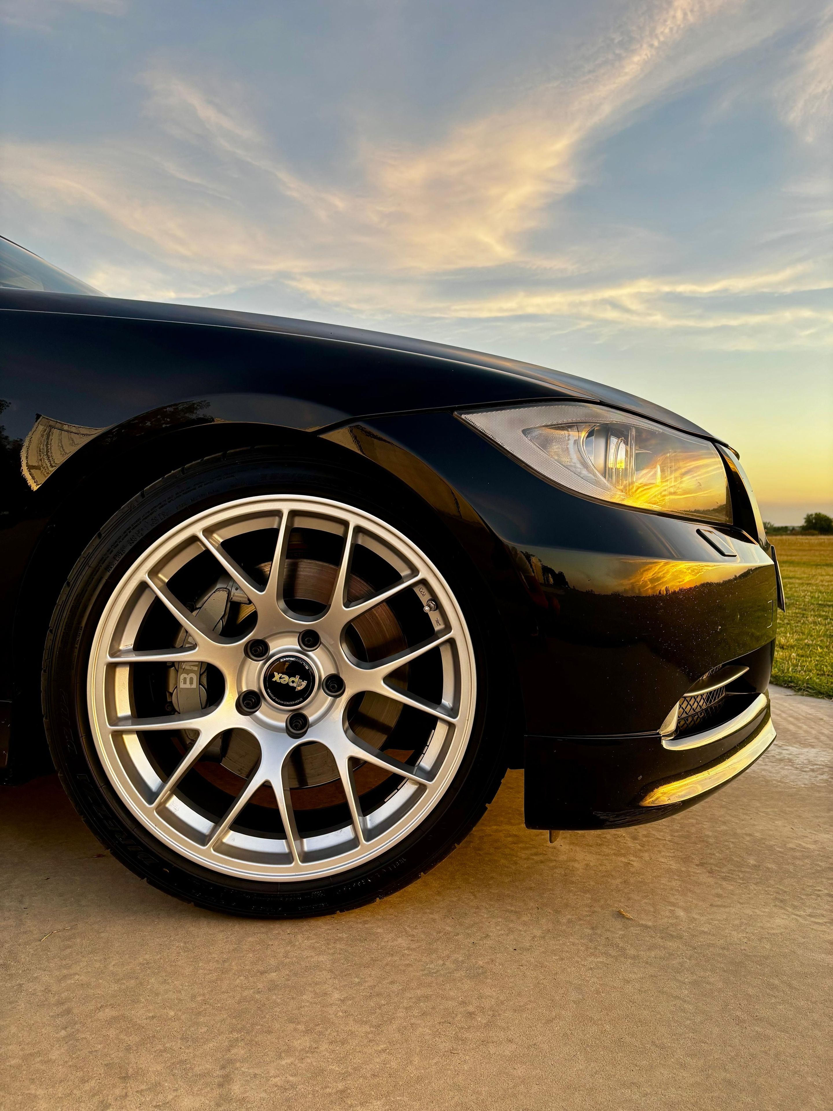 Black BMW E90 Sedan 3 Series with 18" EC-7 Apex wheels in Race Silver