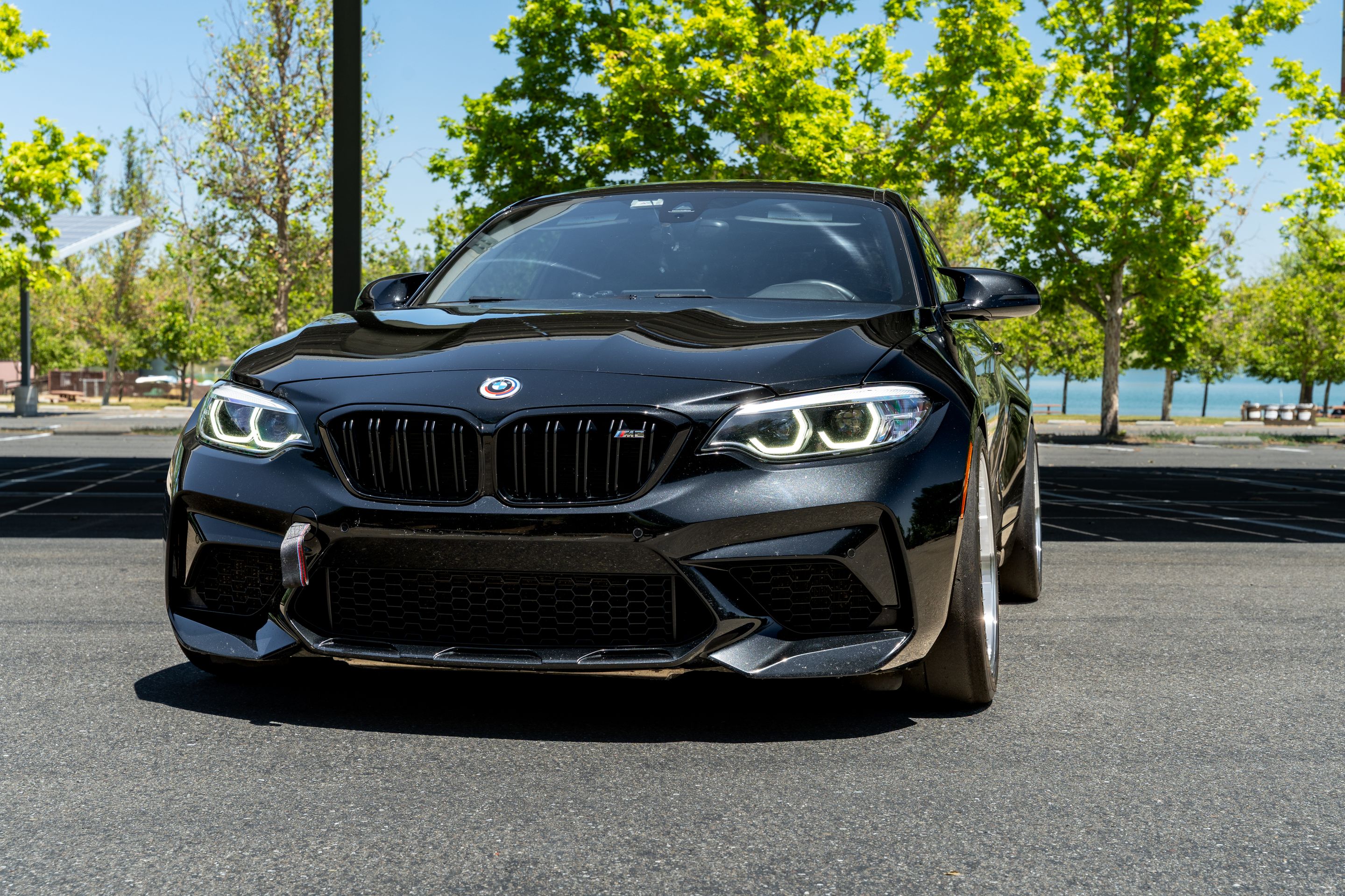 Black BMW F87 M2 with 18" SL-12RT Apex wheels in Machined Lip Race Silver