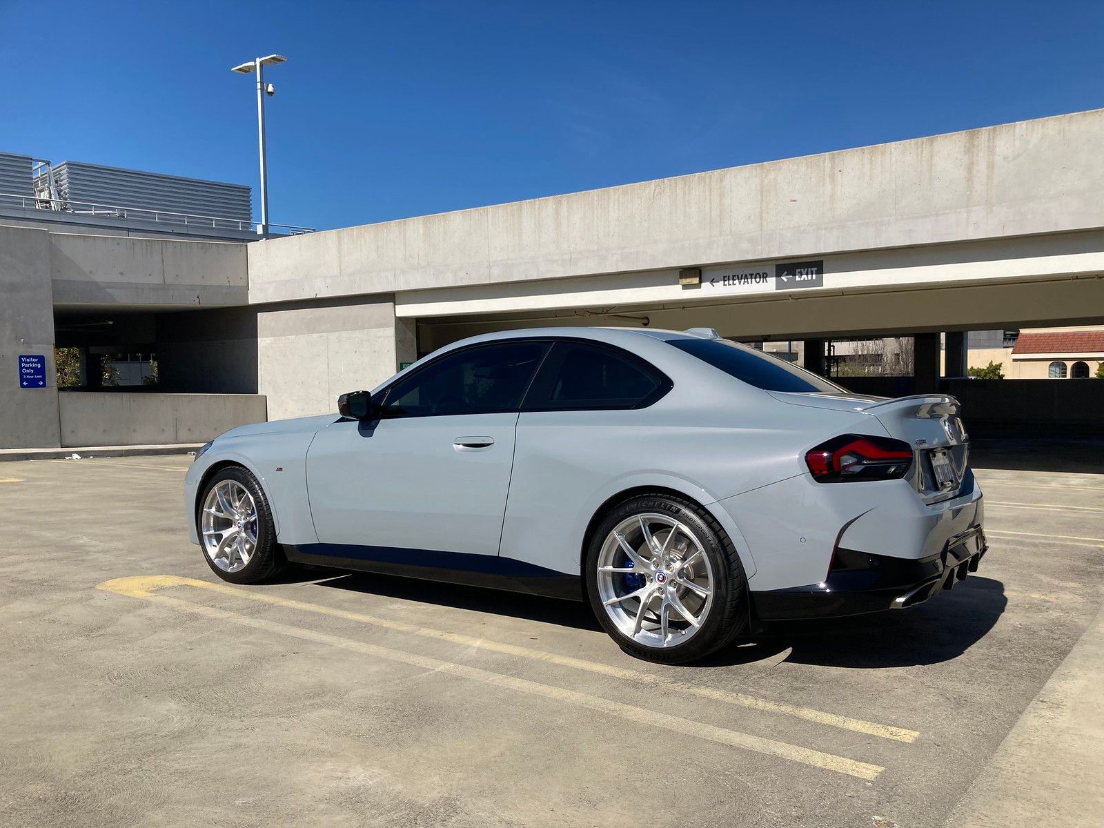 Grey BMW G42 2 Series with 19" VS-5RS Apex wheels in Brushed Clear