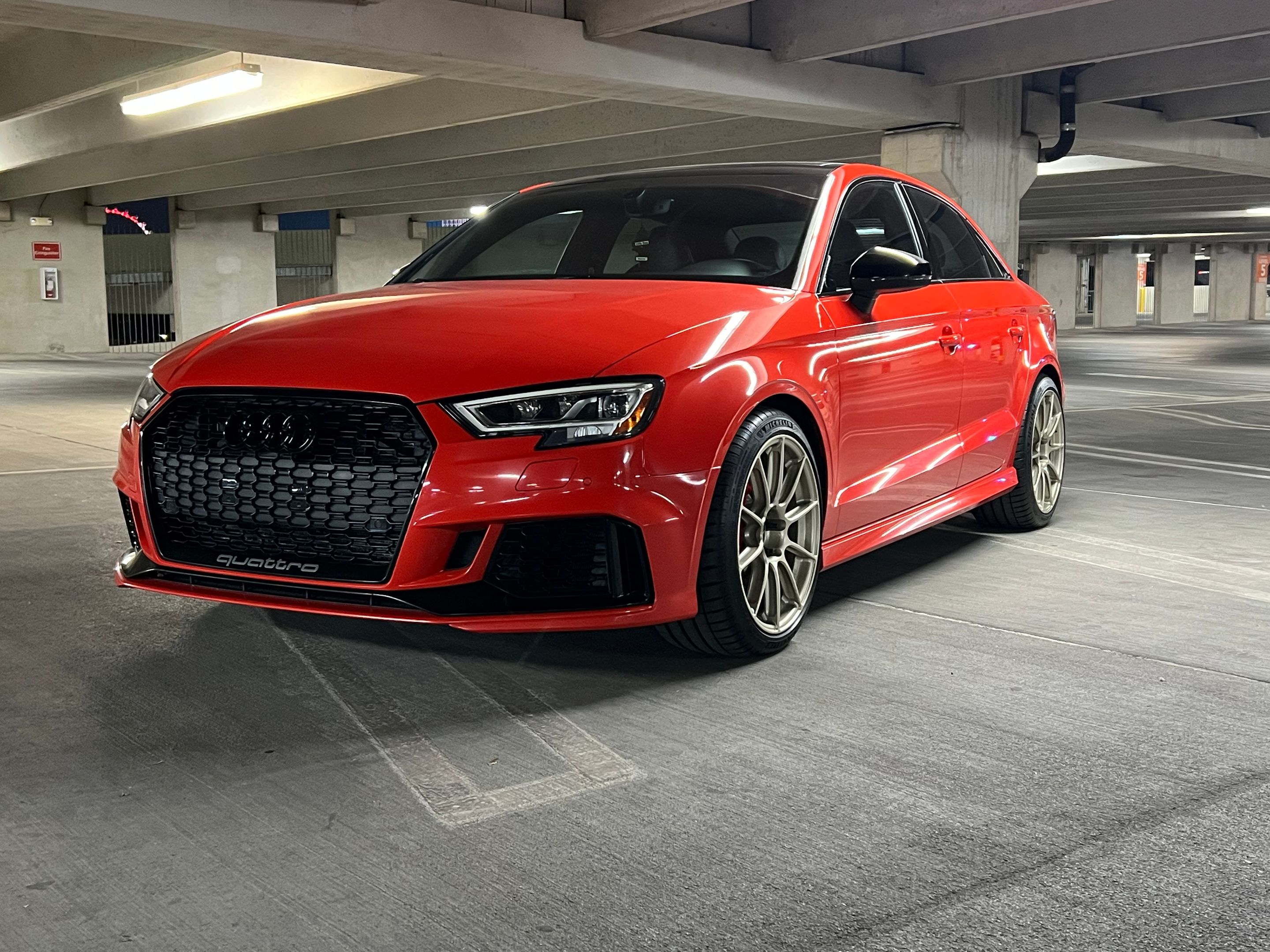 Red Audi 8V RS 3 with 18" SM-10RS Apex wheels in Motorsport Gold