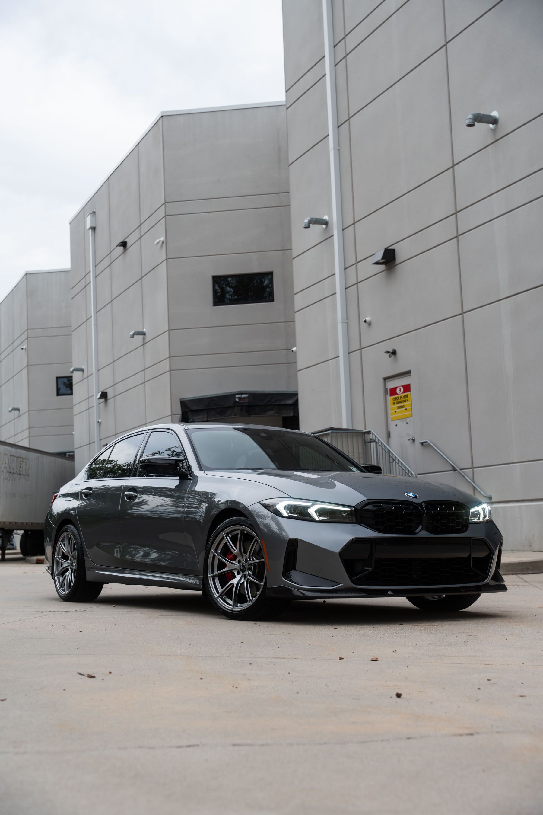 Grey BMW G20 Sedan 3 Series with 19" VS-5 Apex wheels in Hyper Black
