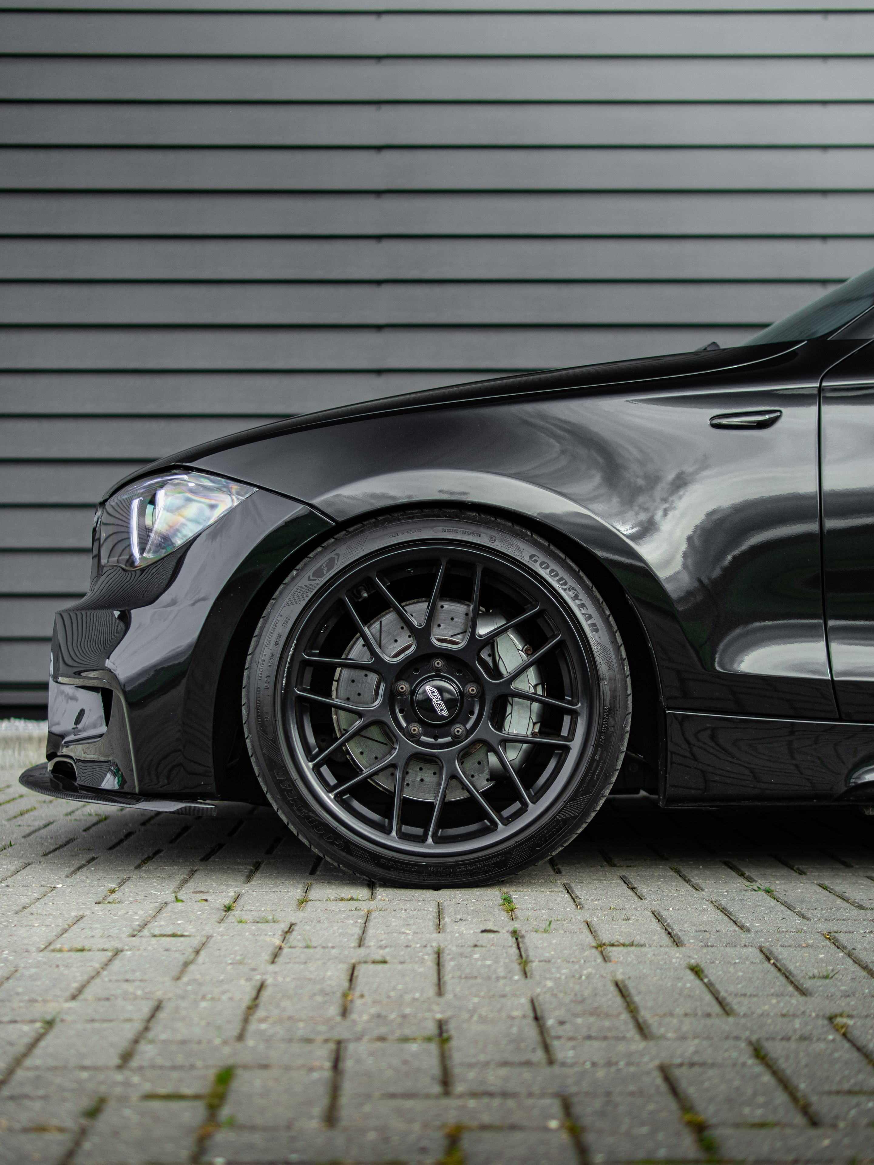 Black BMW E82 Coupe 1 Series with 18" ARC-8 Apex wheels in Satin Black