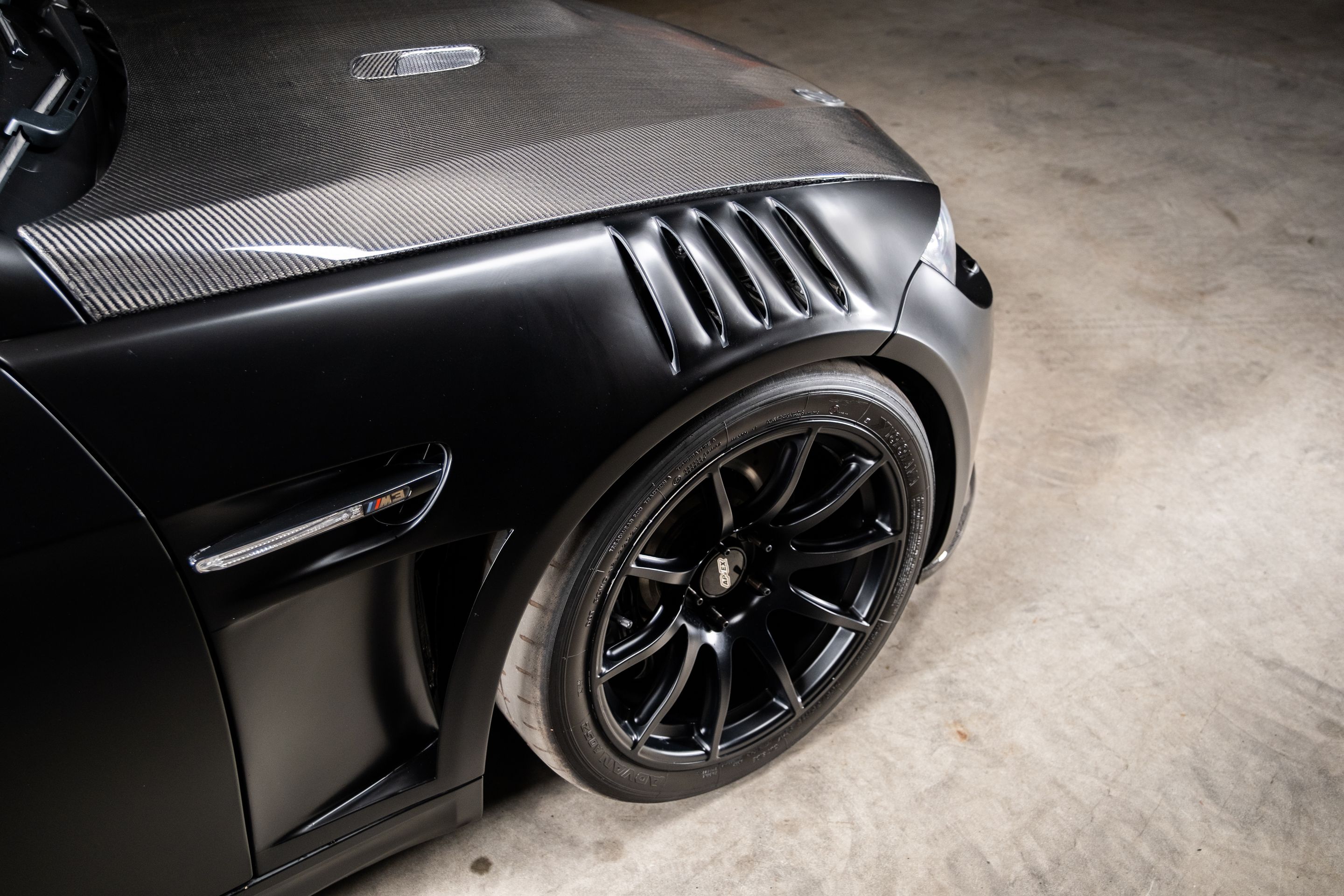 Black BMW E92 Coupe M3 with 18" SM-10 Apex wheels in Satin Black