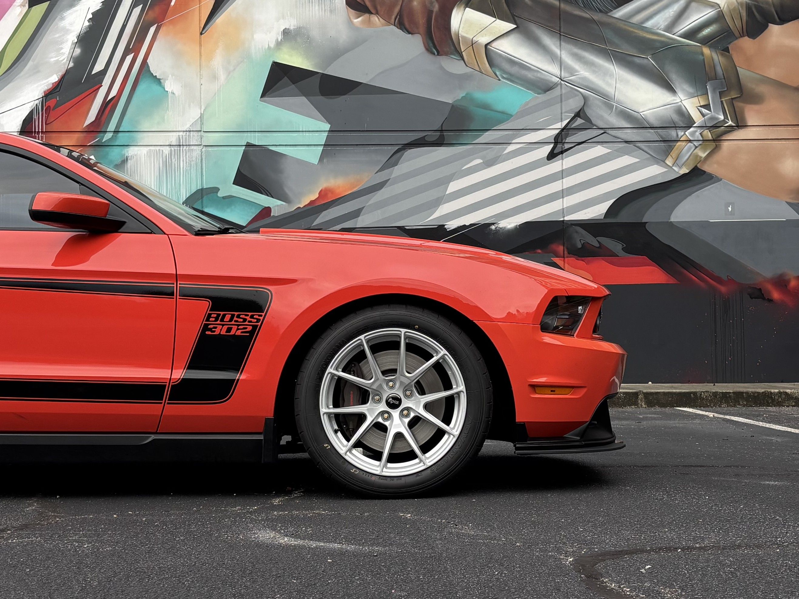 Red Ford S197 Mustang Boss 302 with 18" VS-5 Apex wheels in Race Silver