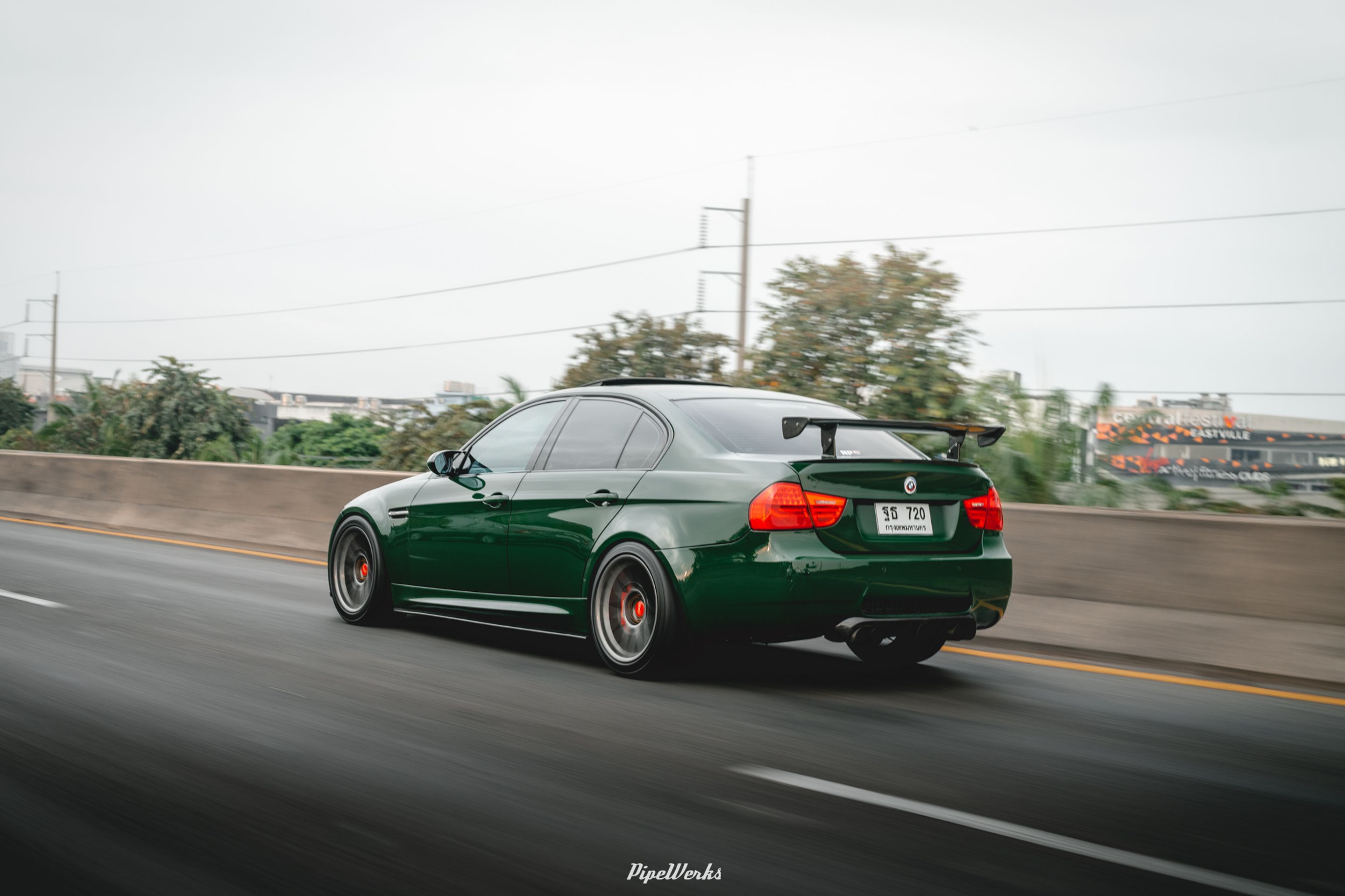 Green BMW E90 Sedan 3 Series with 18" ARC-8 Apex wheels in Anthracite