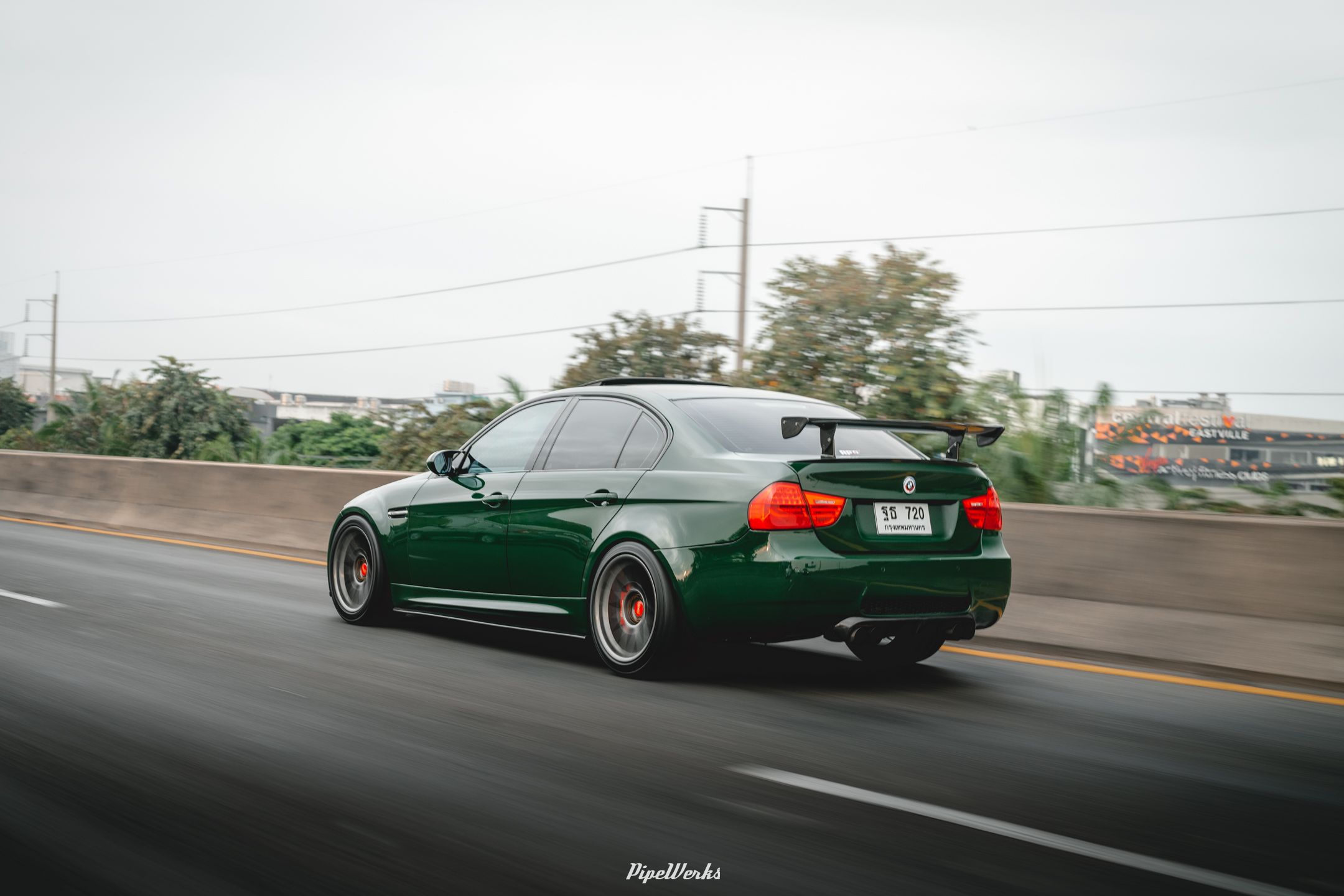 Green BMW E90 Sedan 3 Series with 18" ARC-8 Apex wheels in Anthracite