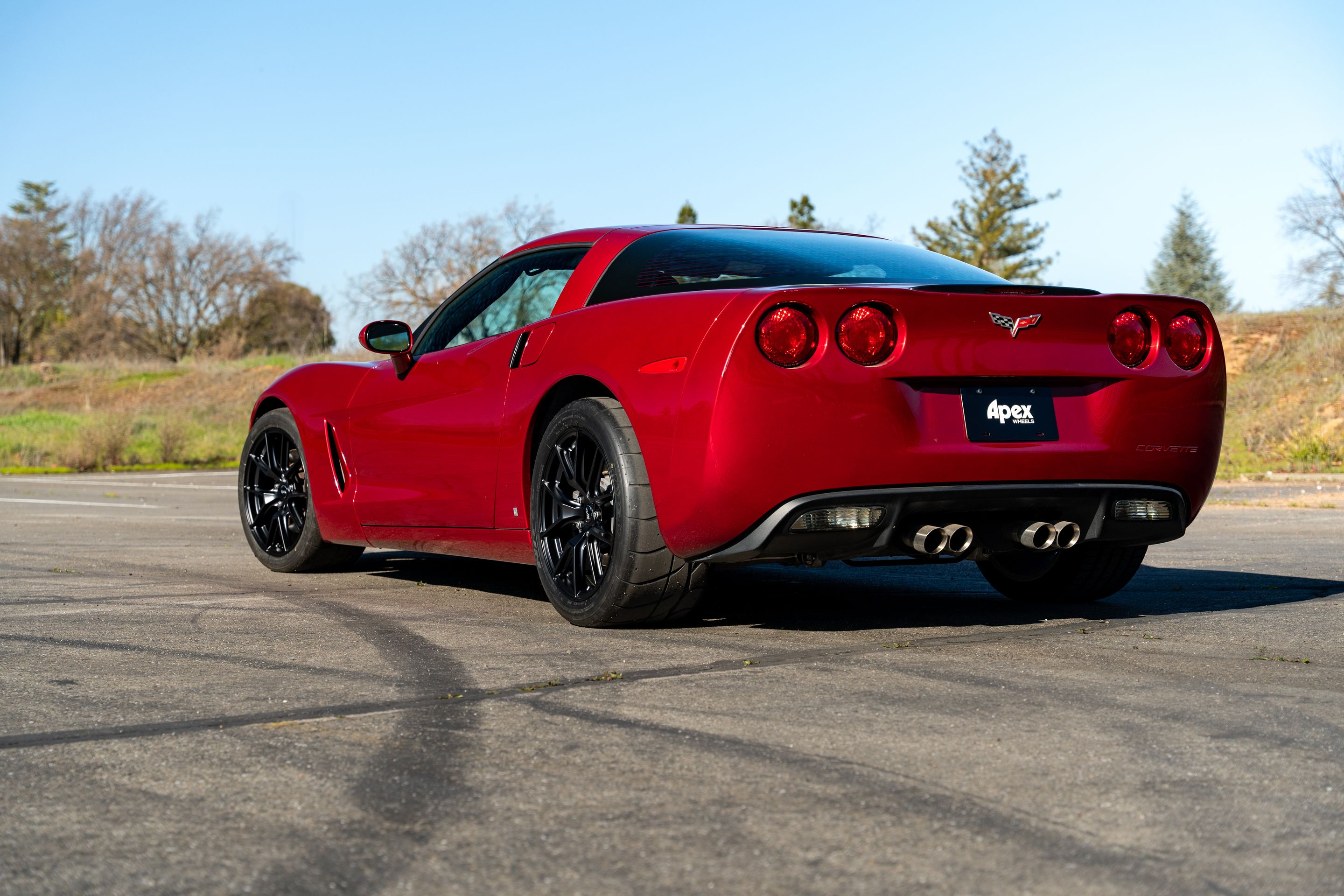 Red Chevrolet C6 Corvette Base/Z51 with 18" VS-5 Apex wheels in Satin Black