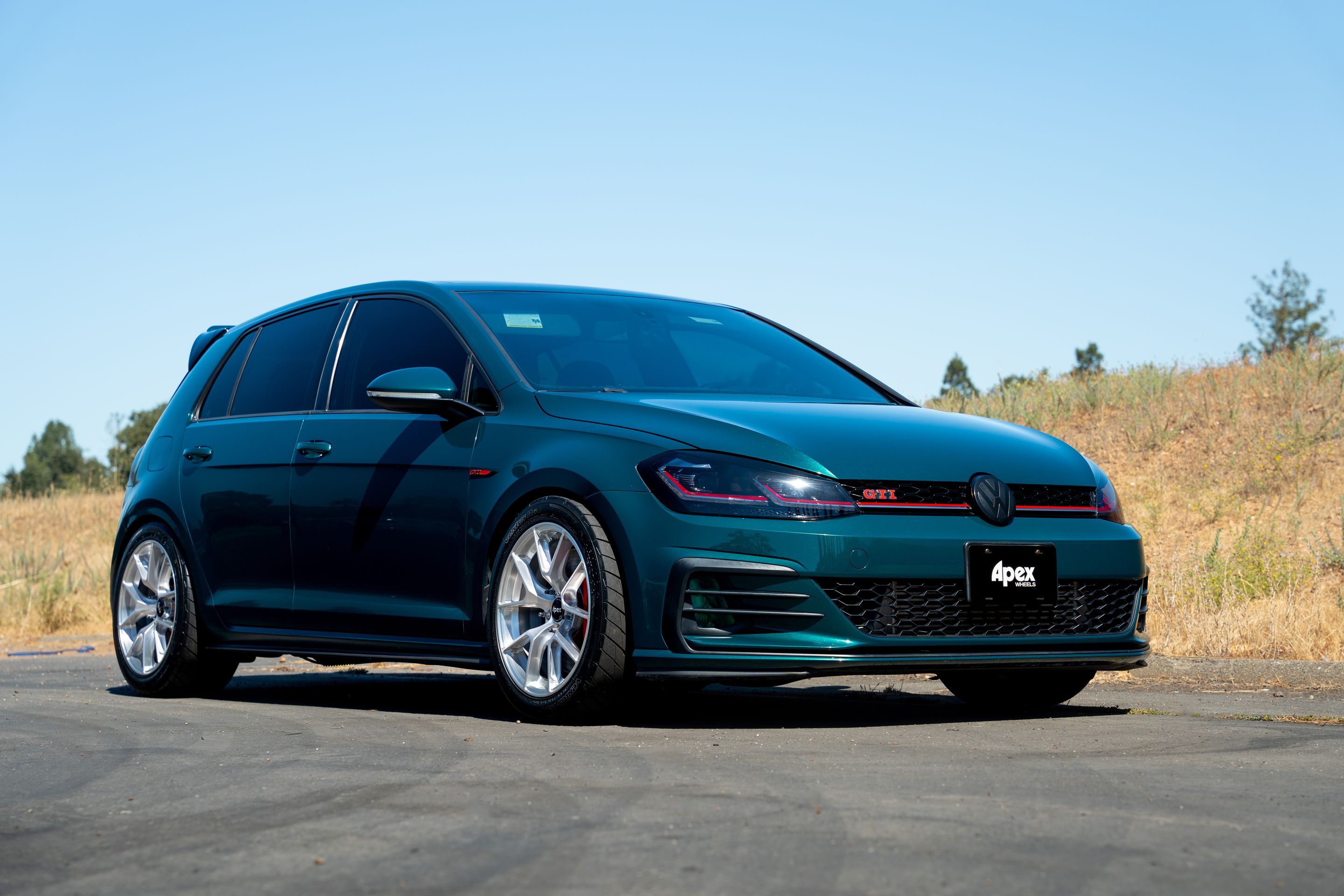 Green VW MK7 GTI with 17" VS-5RS Apex wheels in Brushed Clear