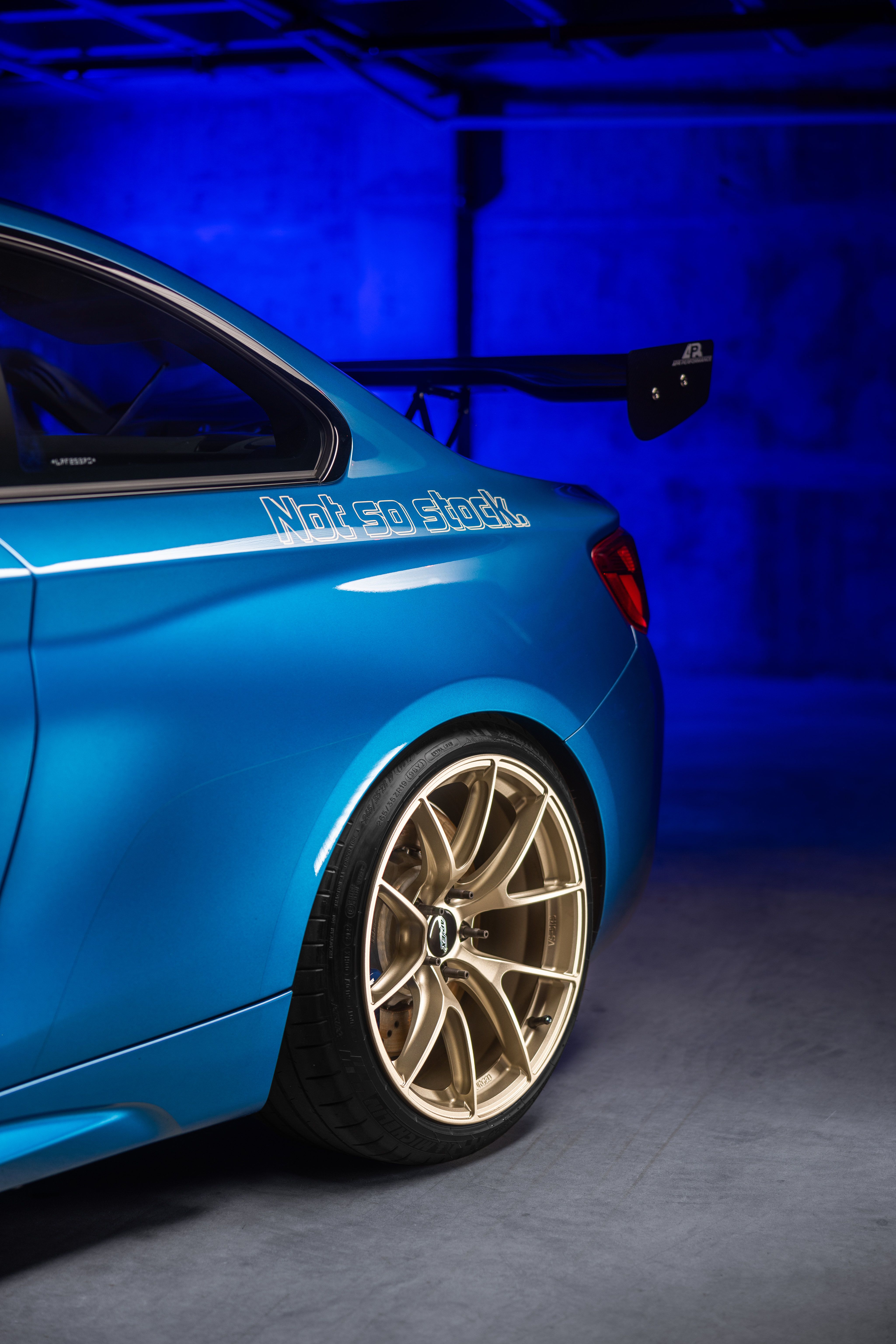 Blue BMW F87 M2 with 19" VS-5RS Apex wheels in Motorsport Gold