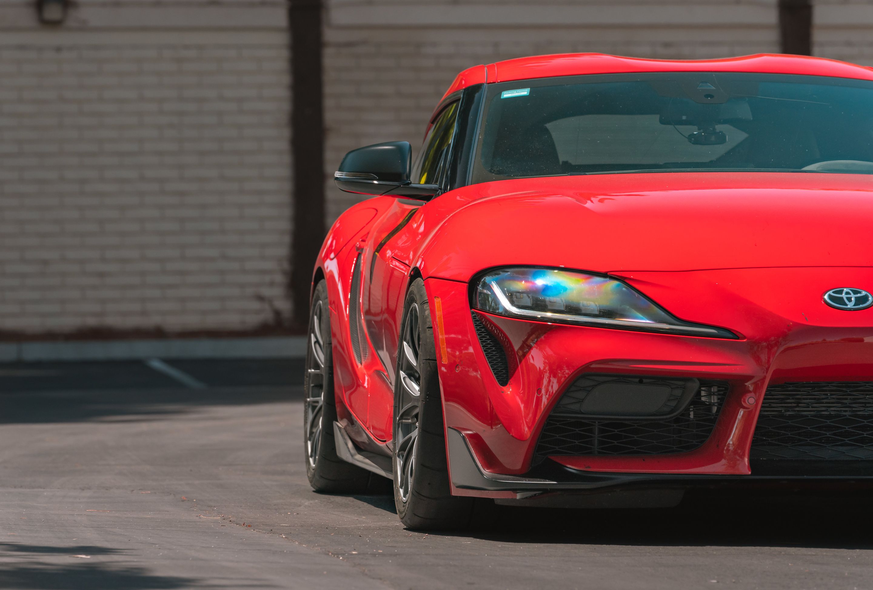 Red Toyota GR Supra with 18" EC-7RS Apex wheels in Anthracite