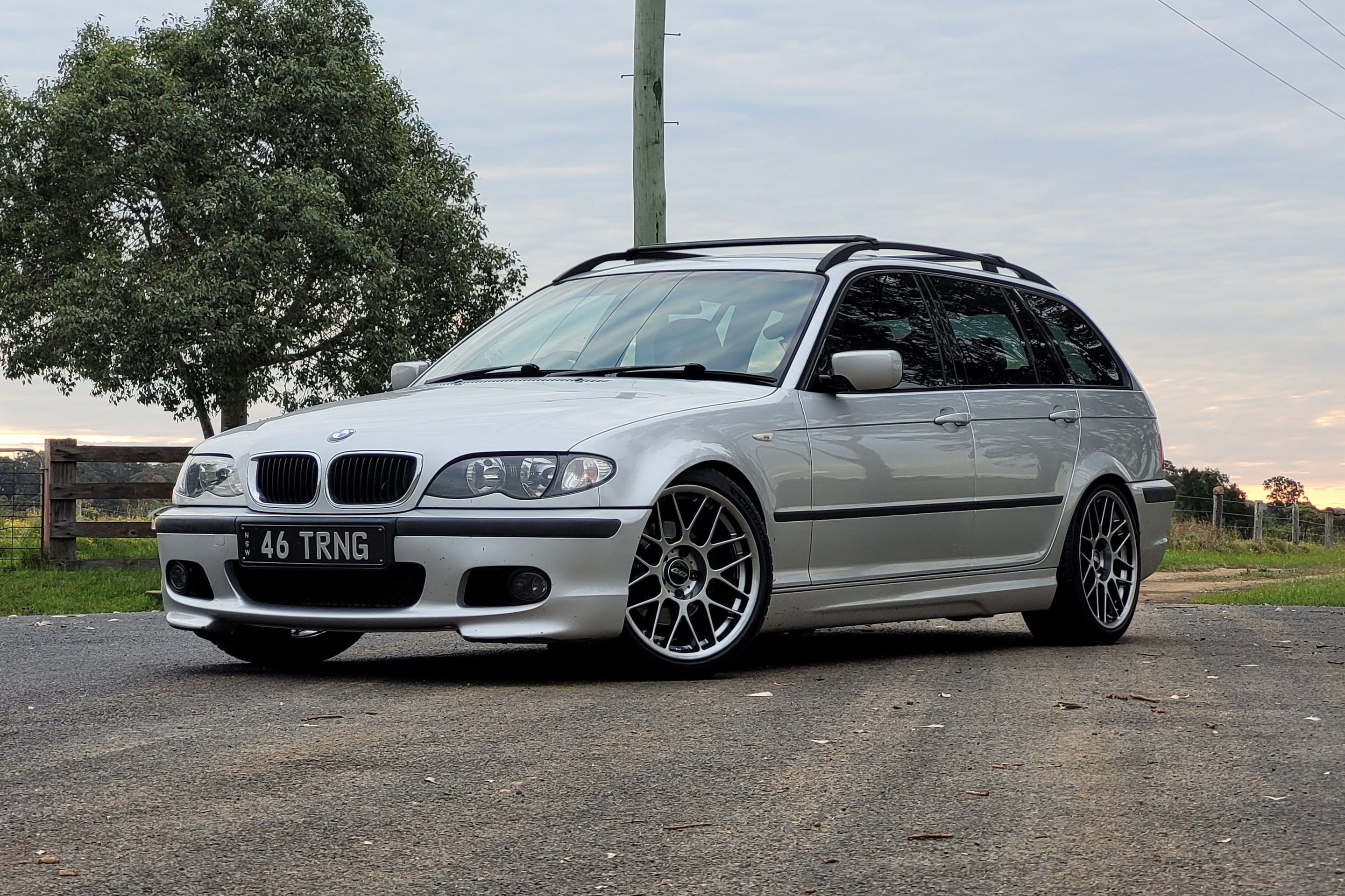 Silver BMW E46 3 Series with 18" ARC-8 Apex wheels in Hyper Black