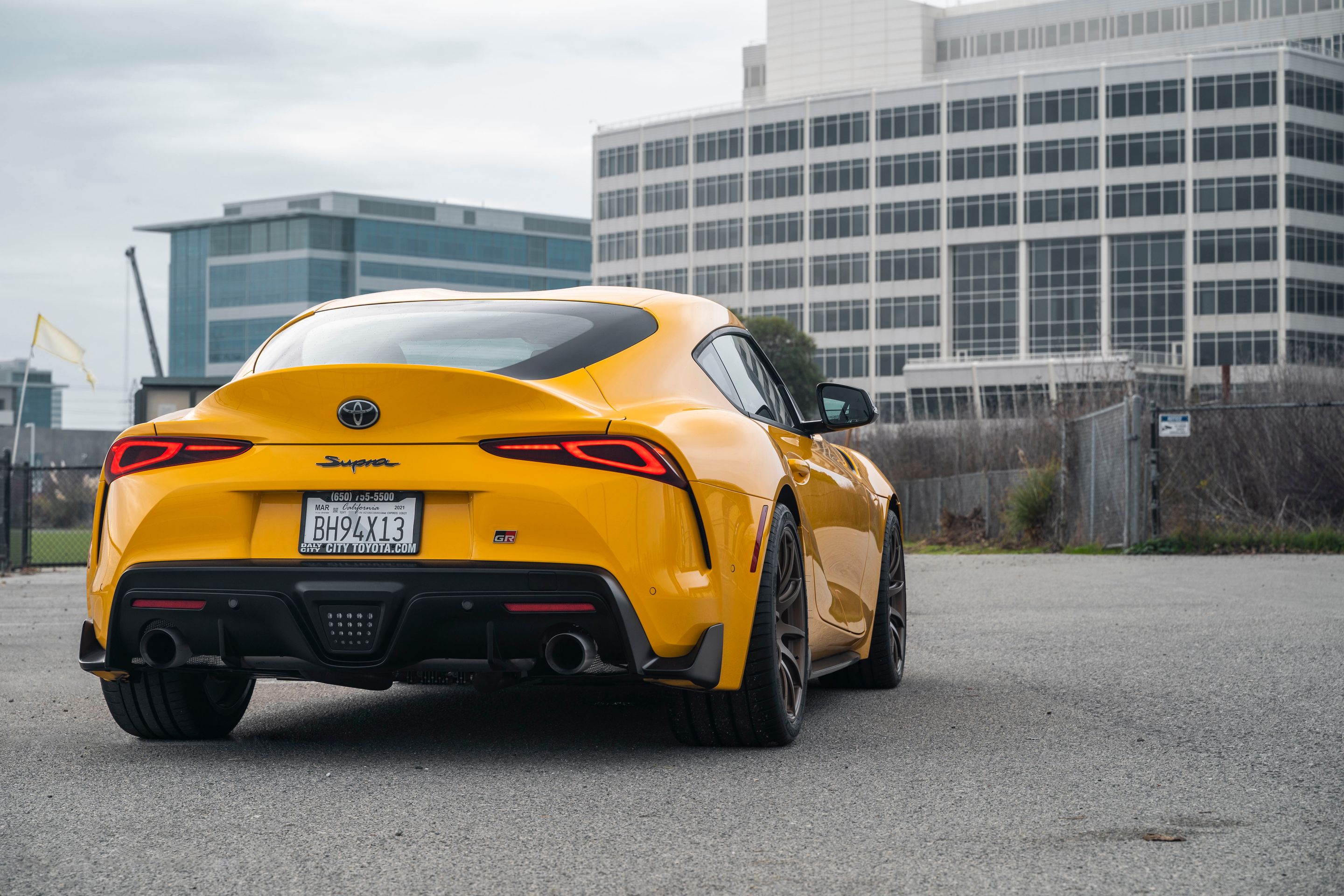 Yellow Toyota GR Supra with 19" SM-10 Apex wheels in Satin Bronze