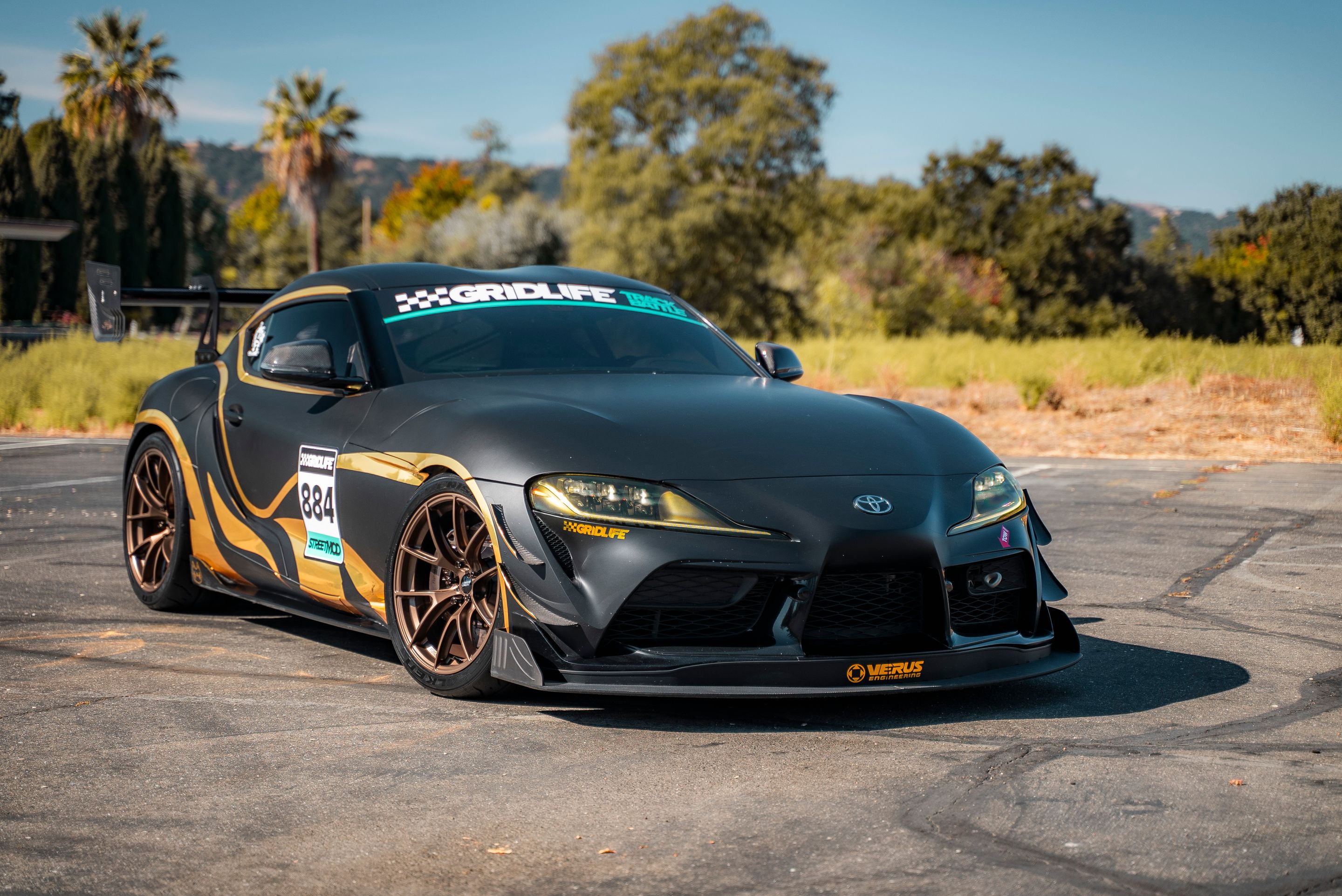 Grey Toyota GR Supra with 19" VS-5RS Apex wheels in Satin Bronze