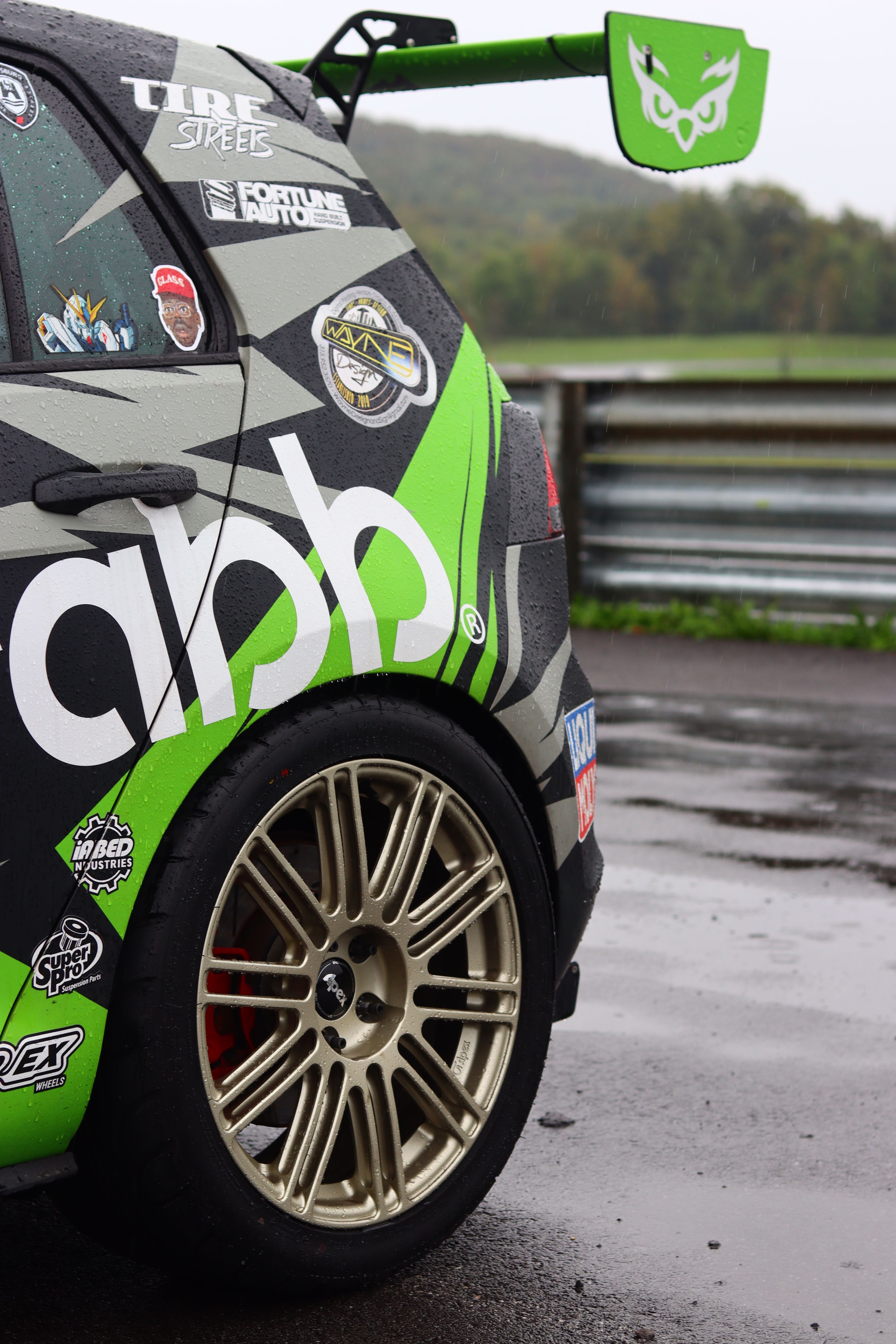 Race Livery VW MK7 GTI with 18" TC-10RT Apex wheels in Motorsport Gold