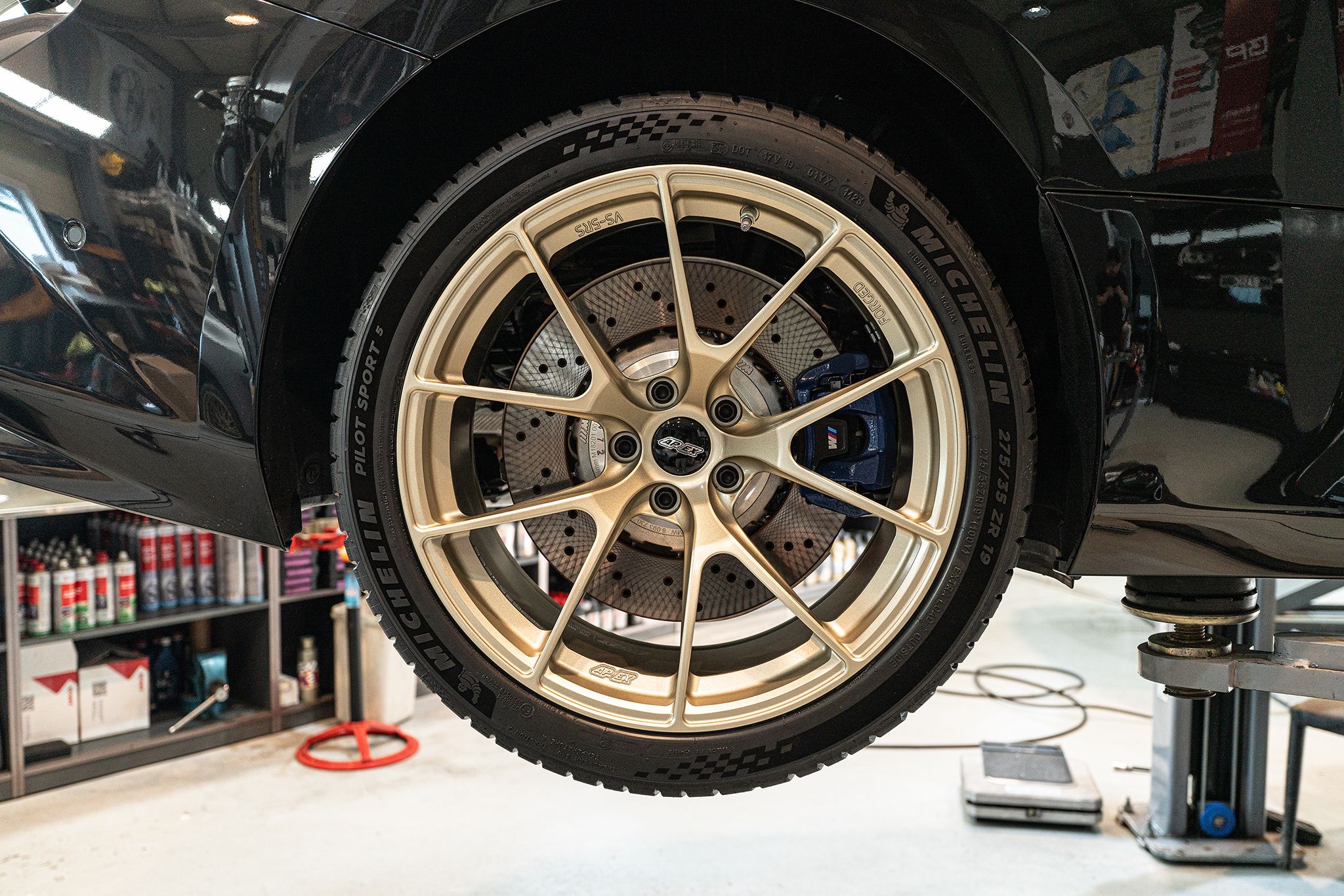 Black BMW G87 M2 with 19" VS-5RS Apex wheels in Motorsport Gold