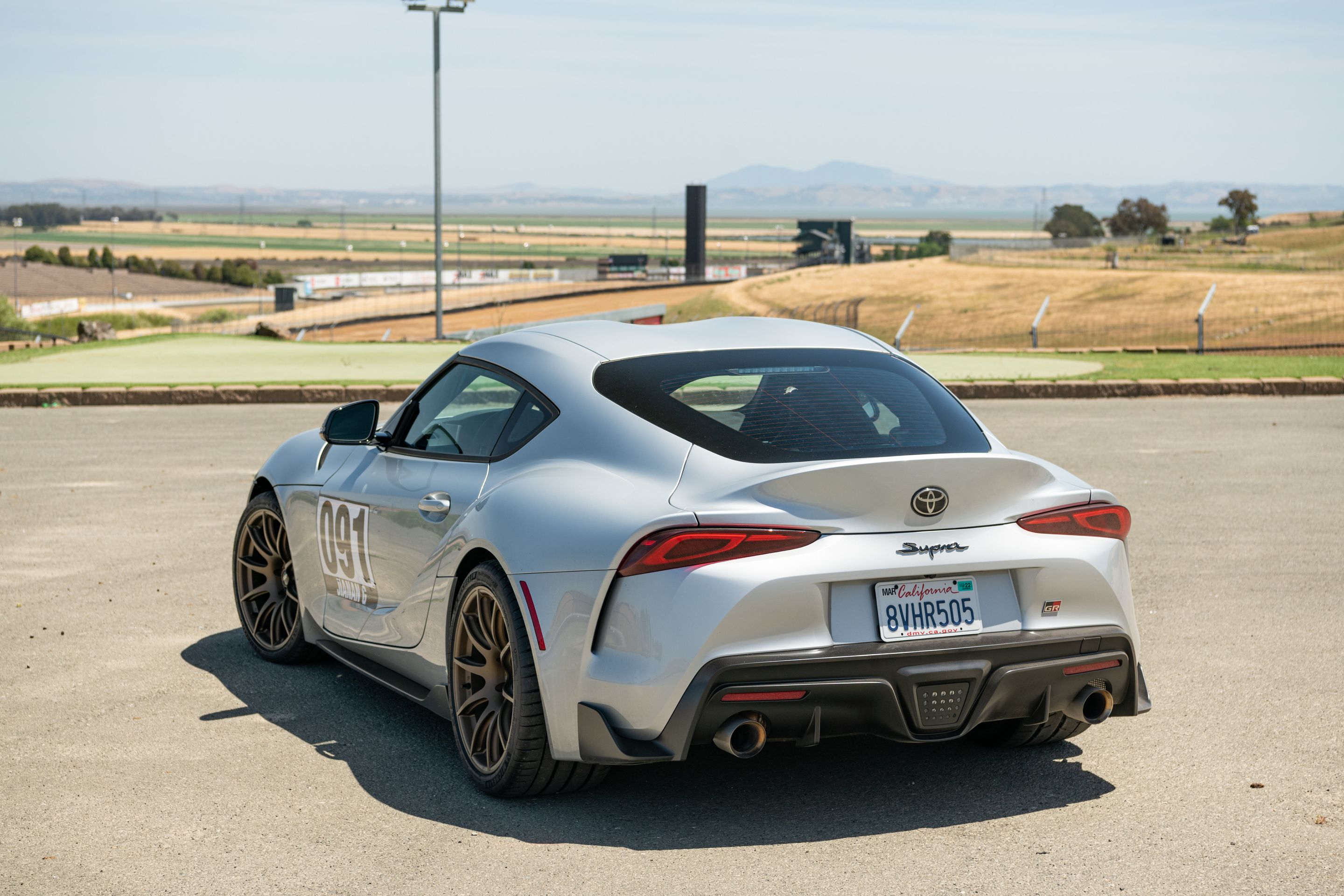 Silver Toyota GR Supra with 19" SM-10 Apex wheels in Satin Bronze
