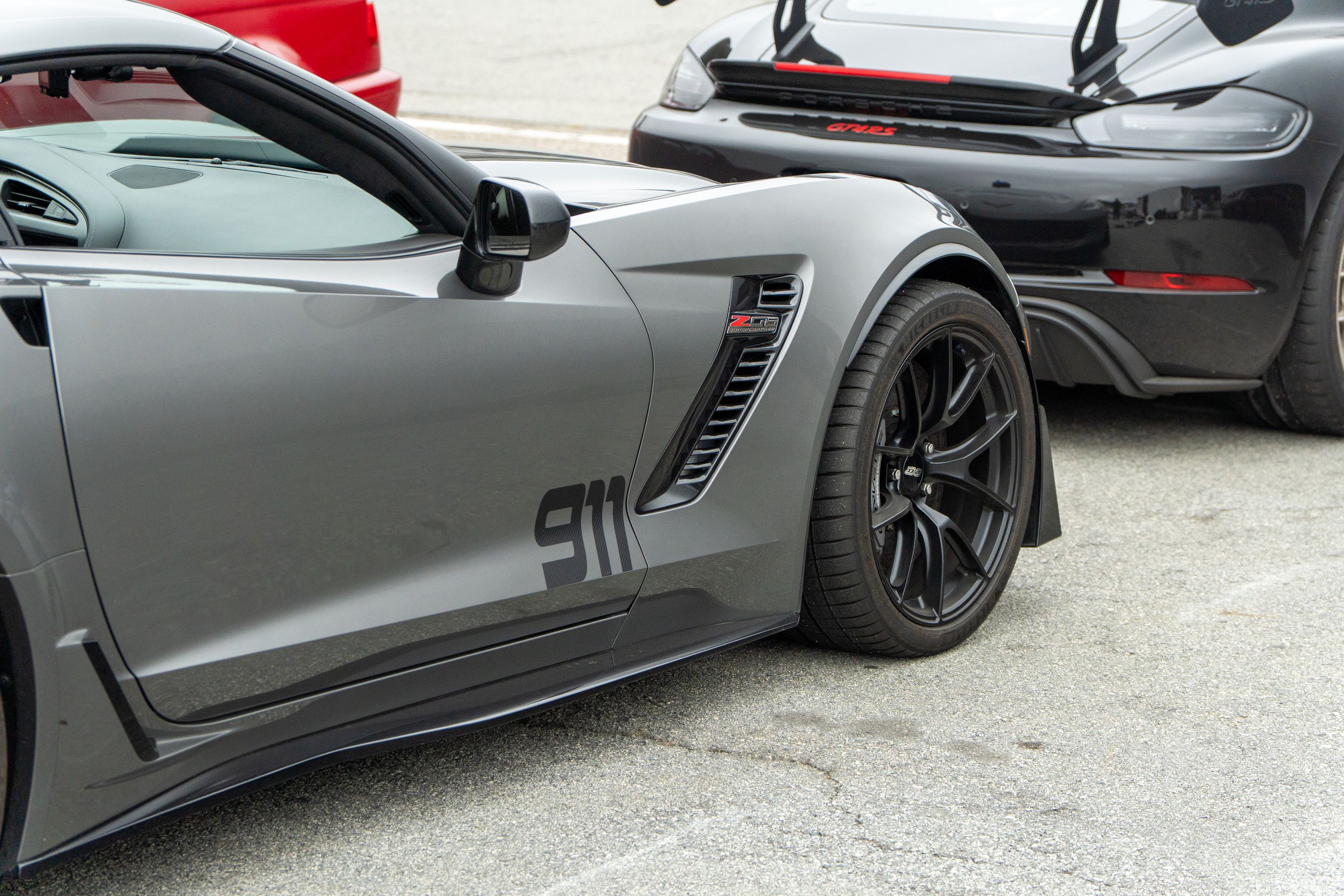 Grey Chevrolet C7 Corvette Z06 with 19" VS-5RS Apex wheels in Satin Black